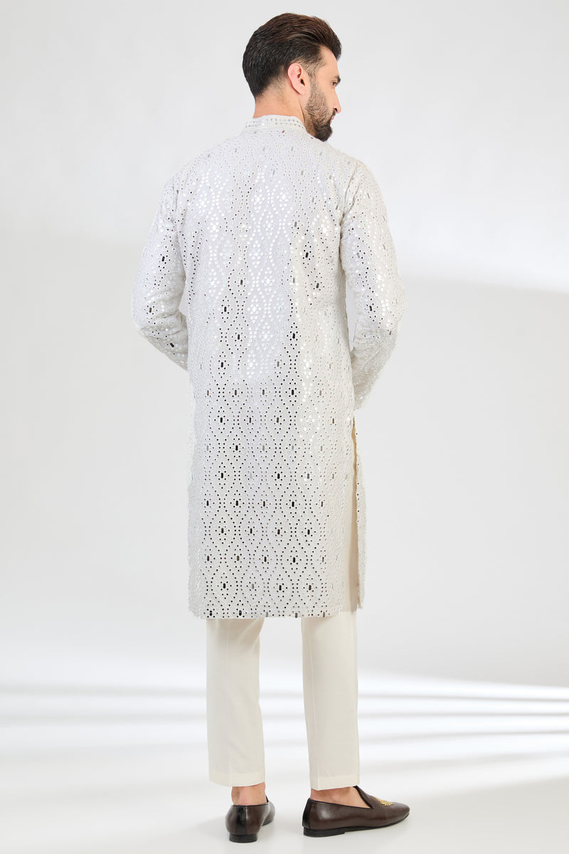 White mirror-work kurta with intricate hand embroidered neckline. - kasbahmen