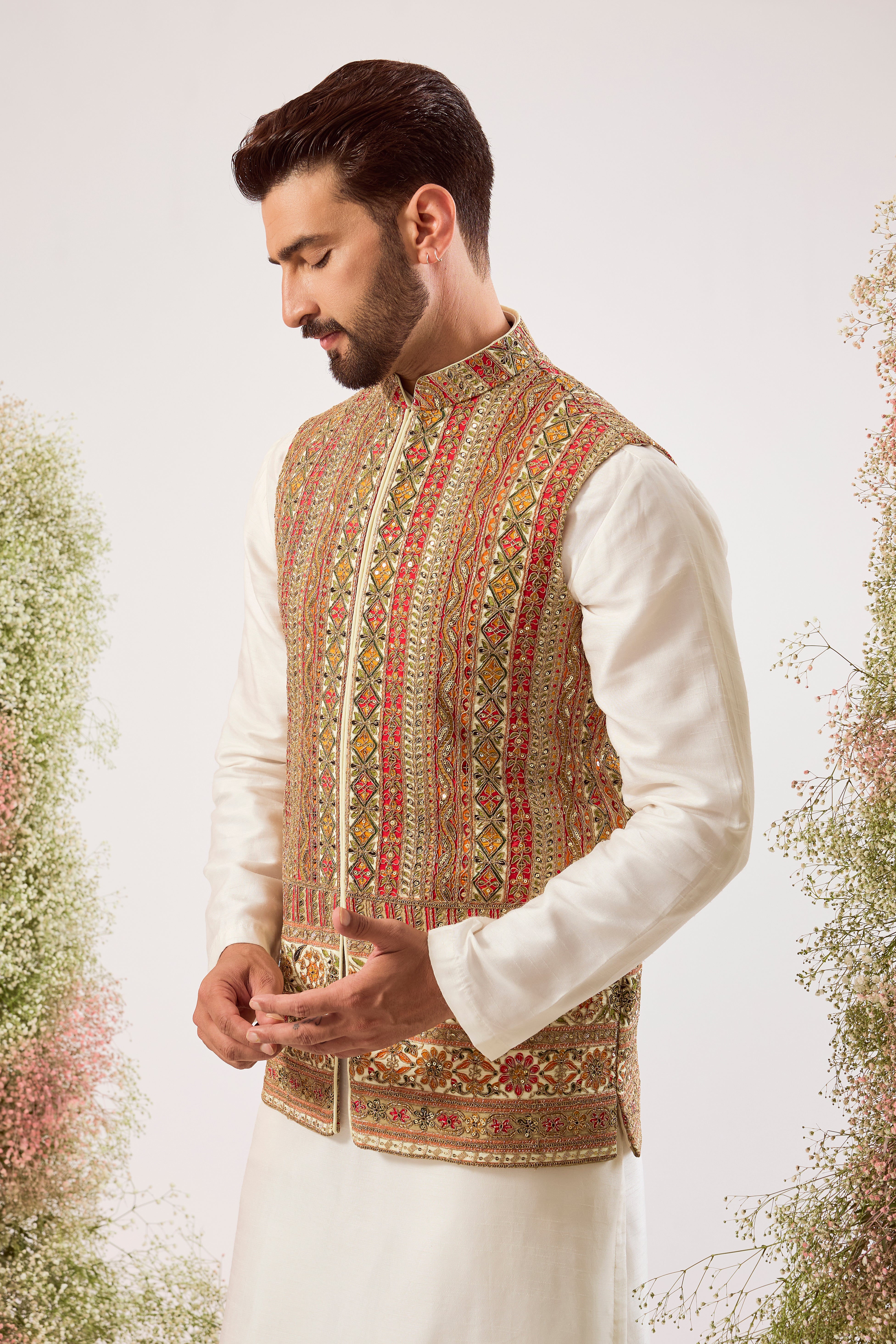 ivory/multi coloured nehru jacket with intricate zari work