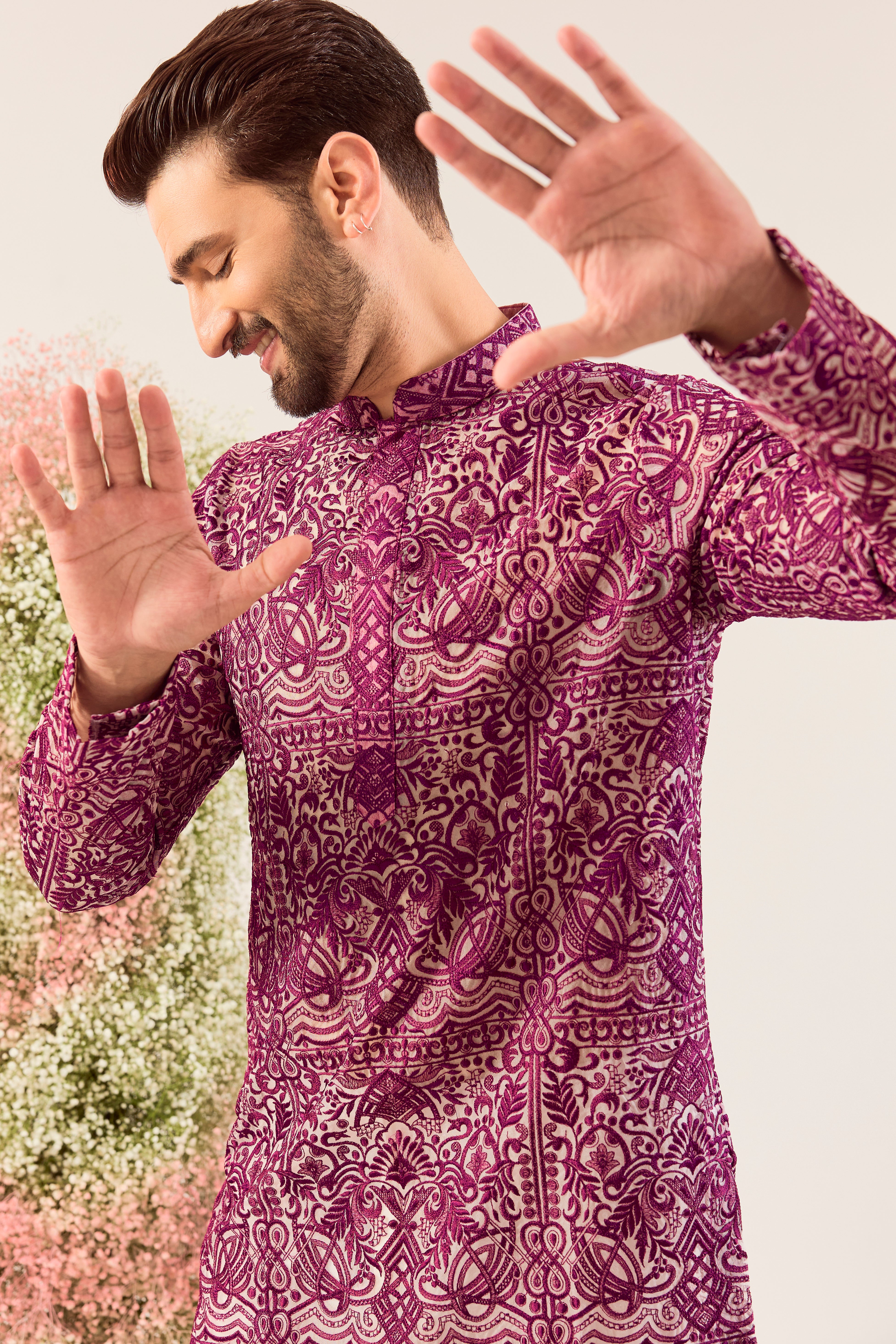 Radiate pure elegance in this magenta long kurta. The see through, intricate Chikankari work tells a story of tradition and grace, creating a look that's both captivating and timeless. It's the perfect blend of modern allure and classic artistry.