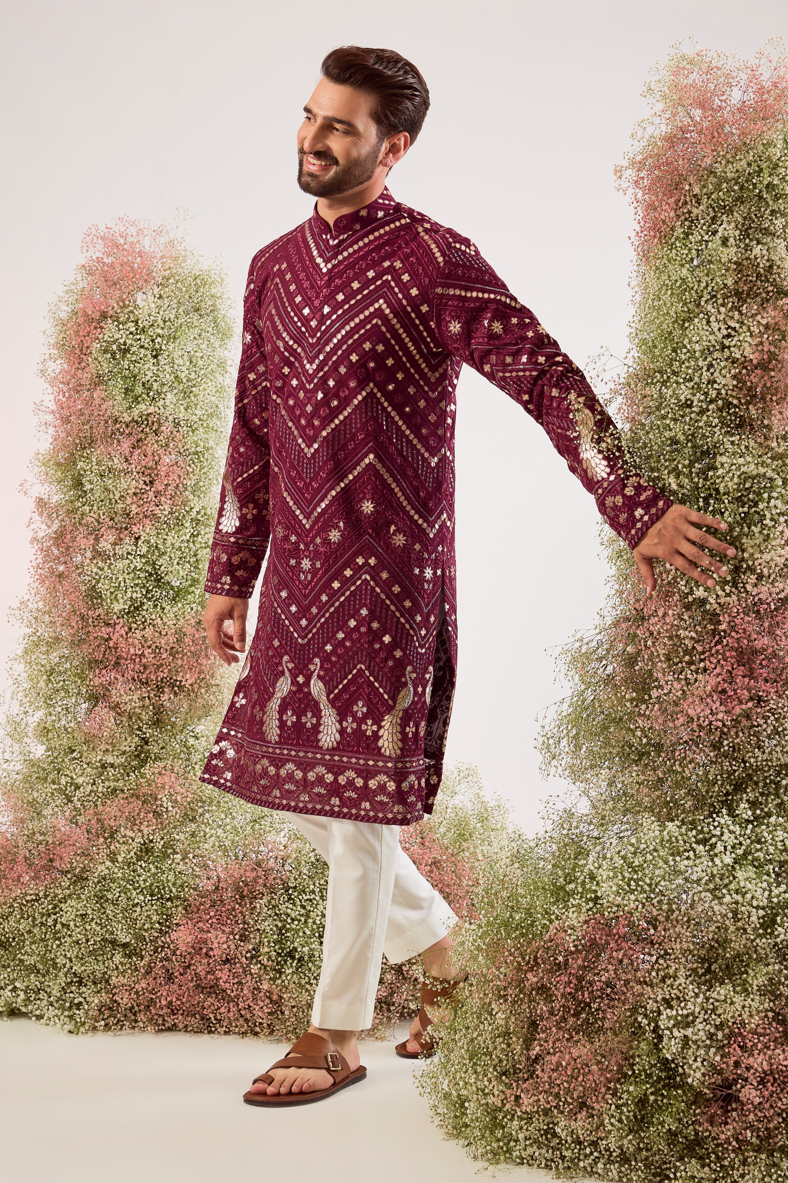 magenta leather patchwork kurta with peacock motifs