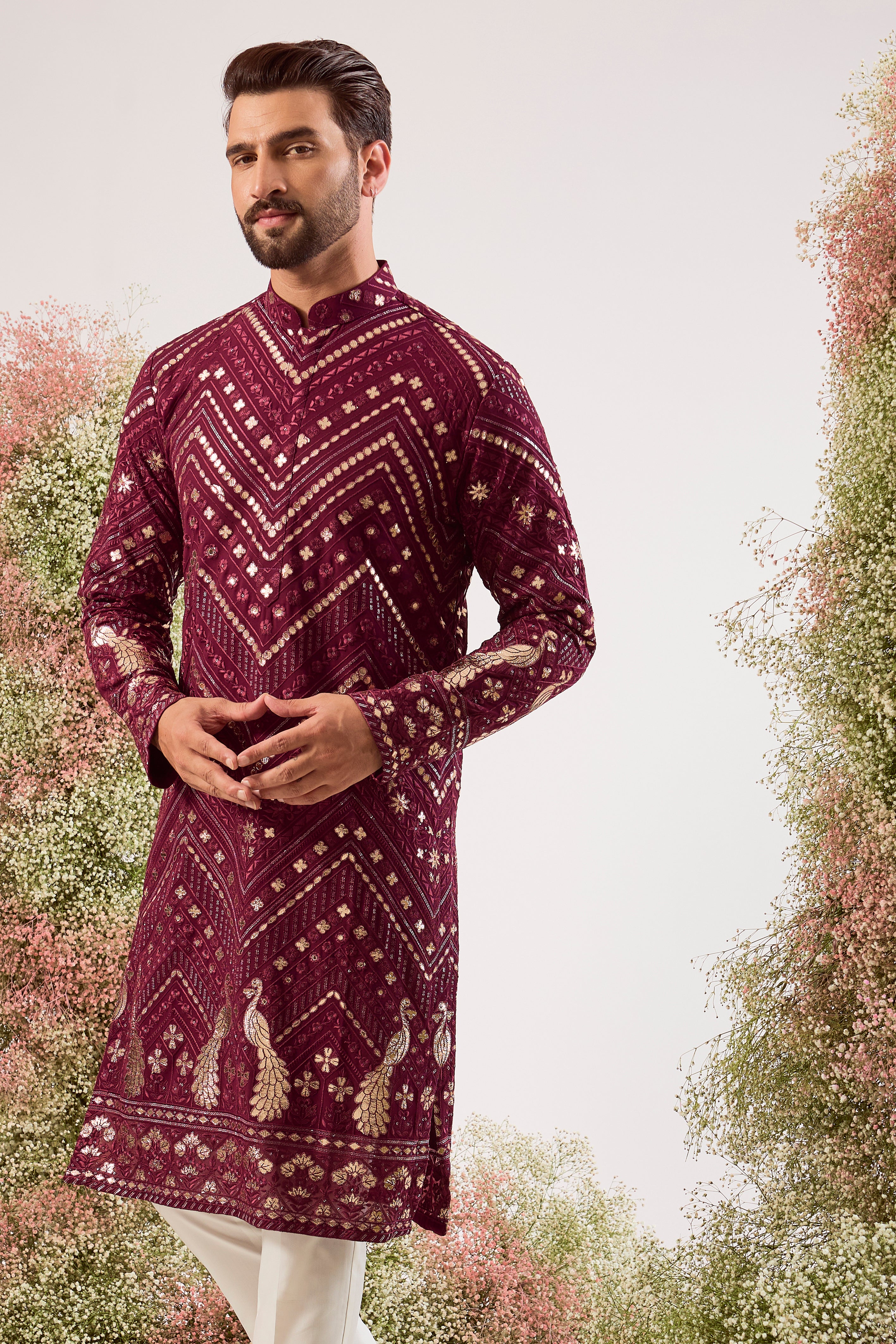 magenta leather patchwork kurta with peacock motifs