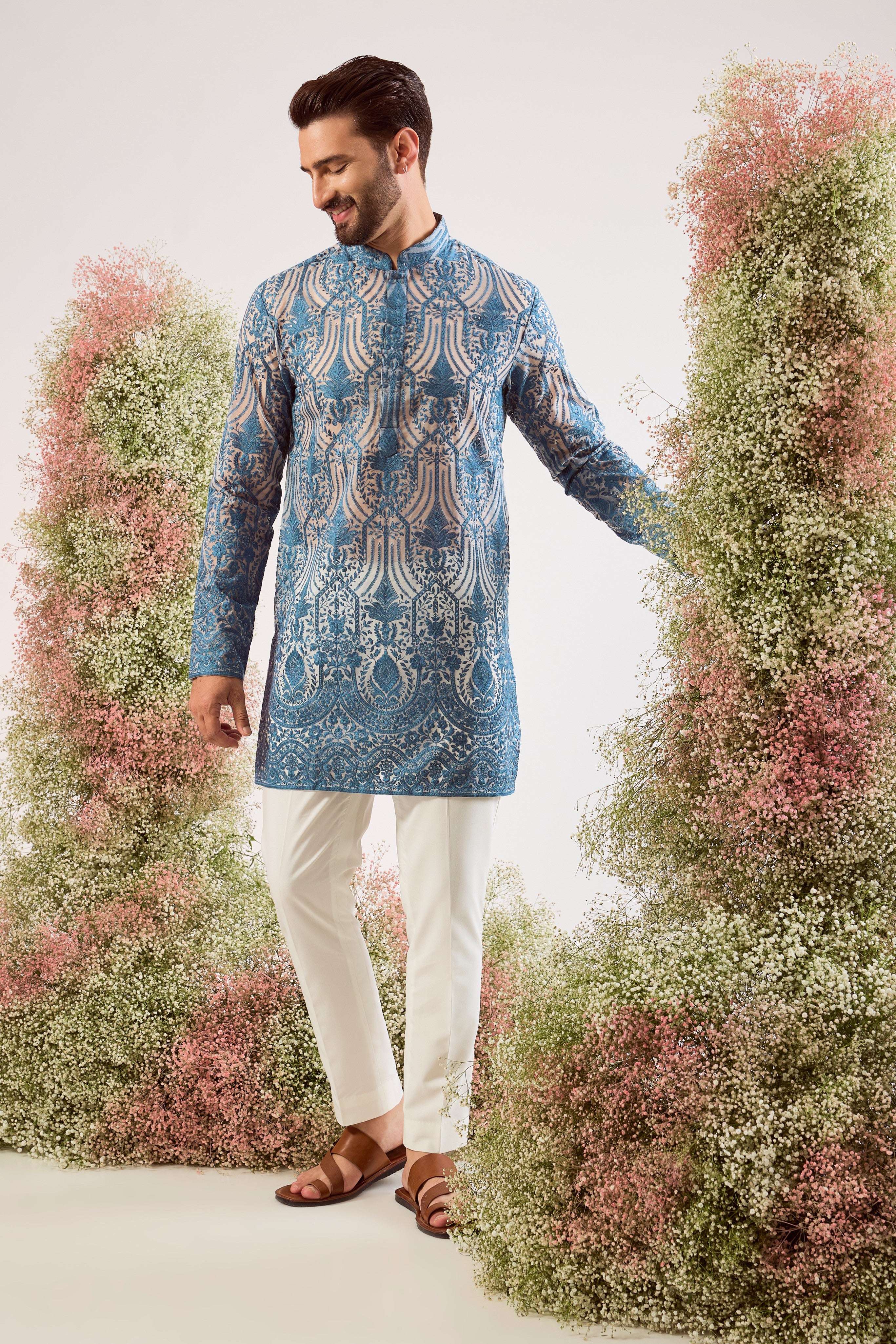radiate elegance in this blue see through short kurta