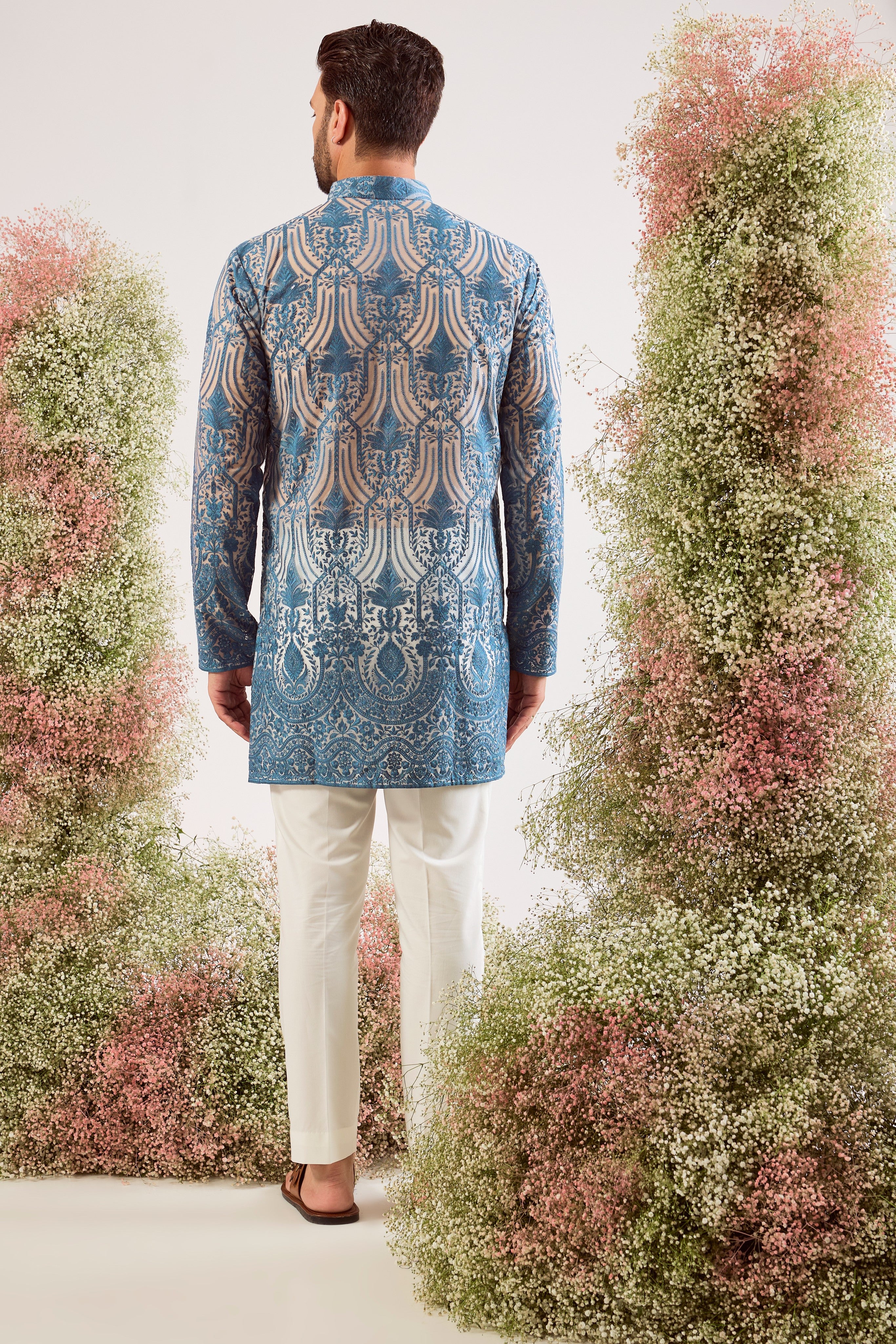 radiate elegance in this blue see through short kurta