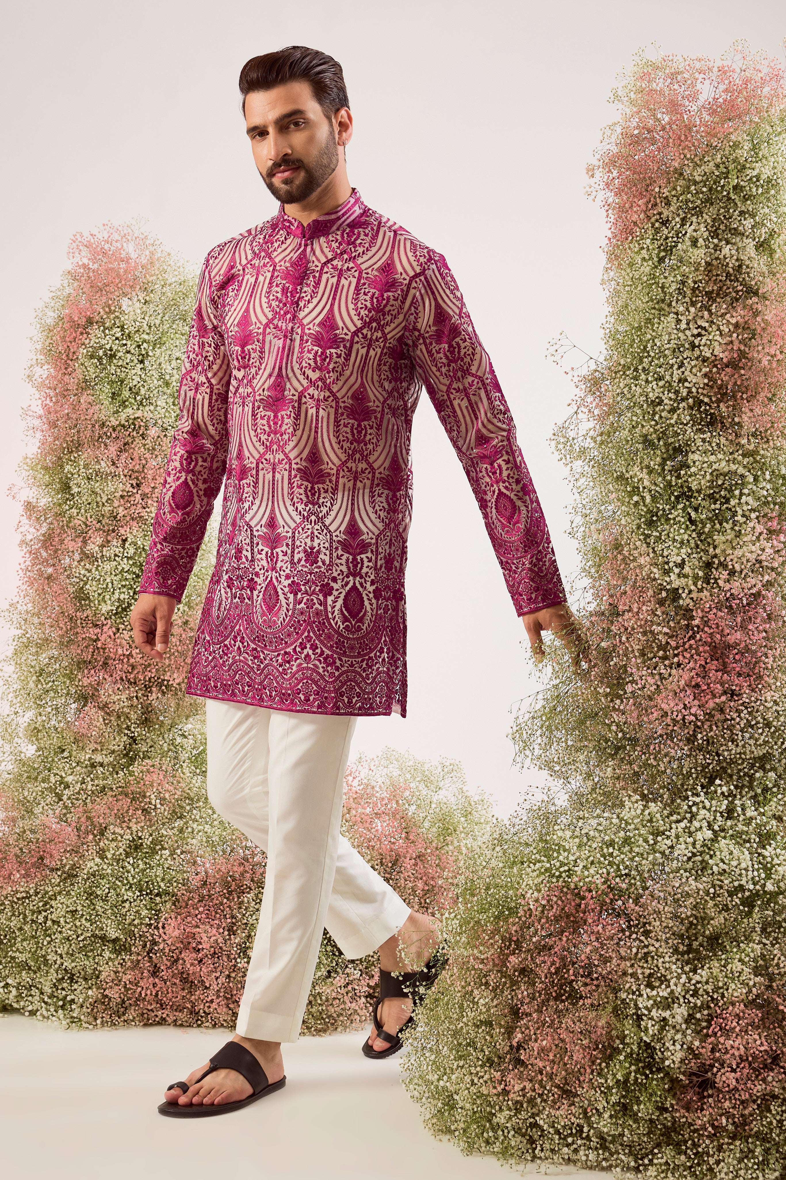 radiate elegance in this magenta see through short kurta