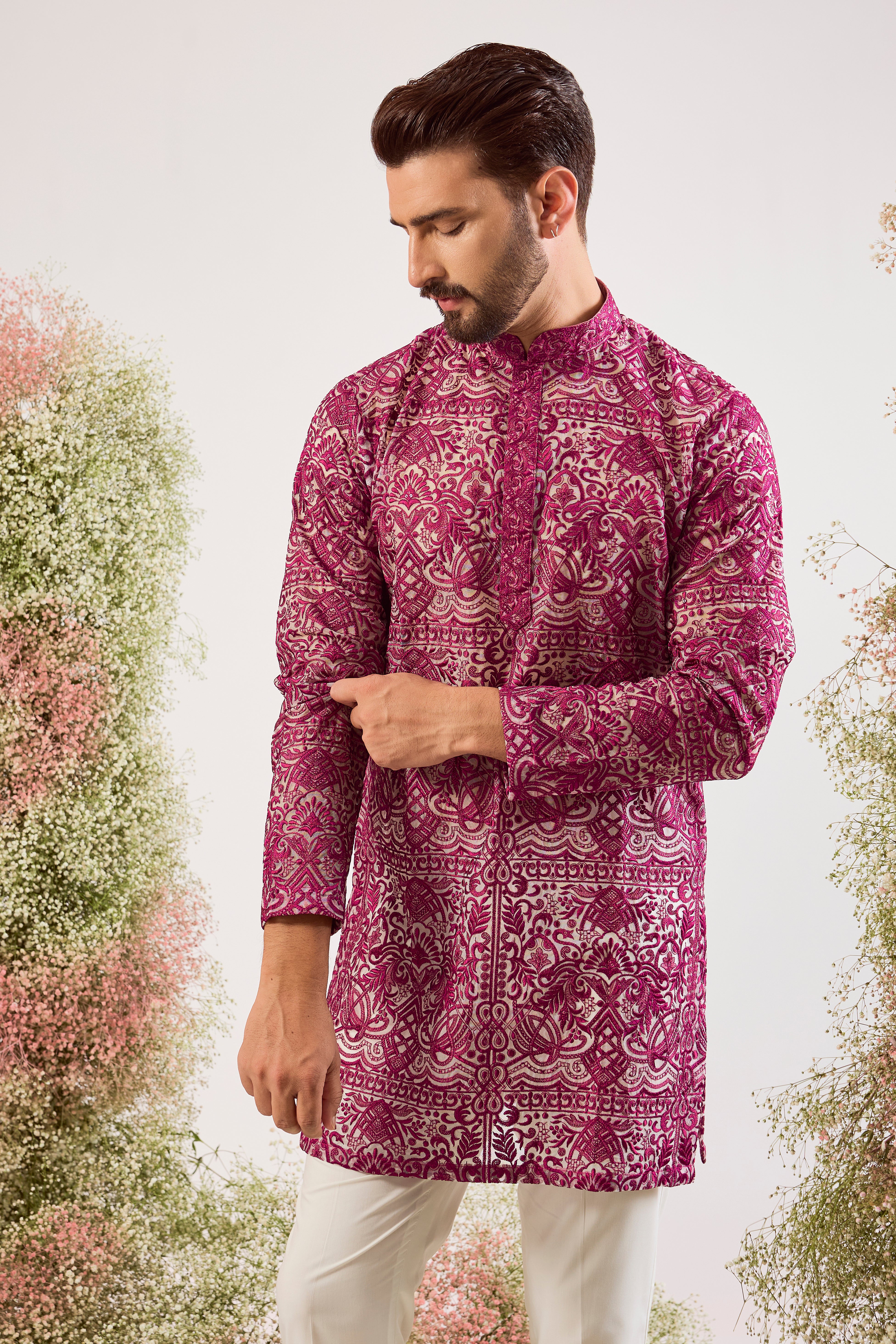 radiate elegance in this magenta open front see through short kurta