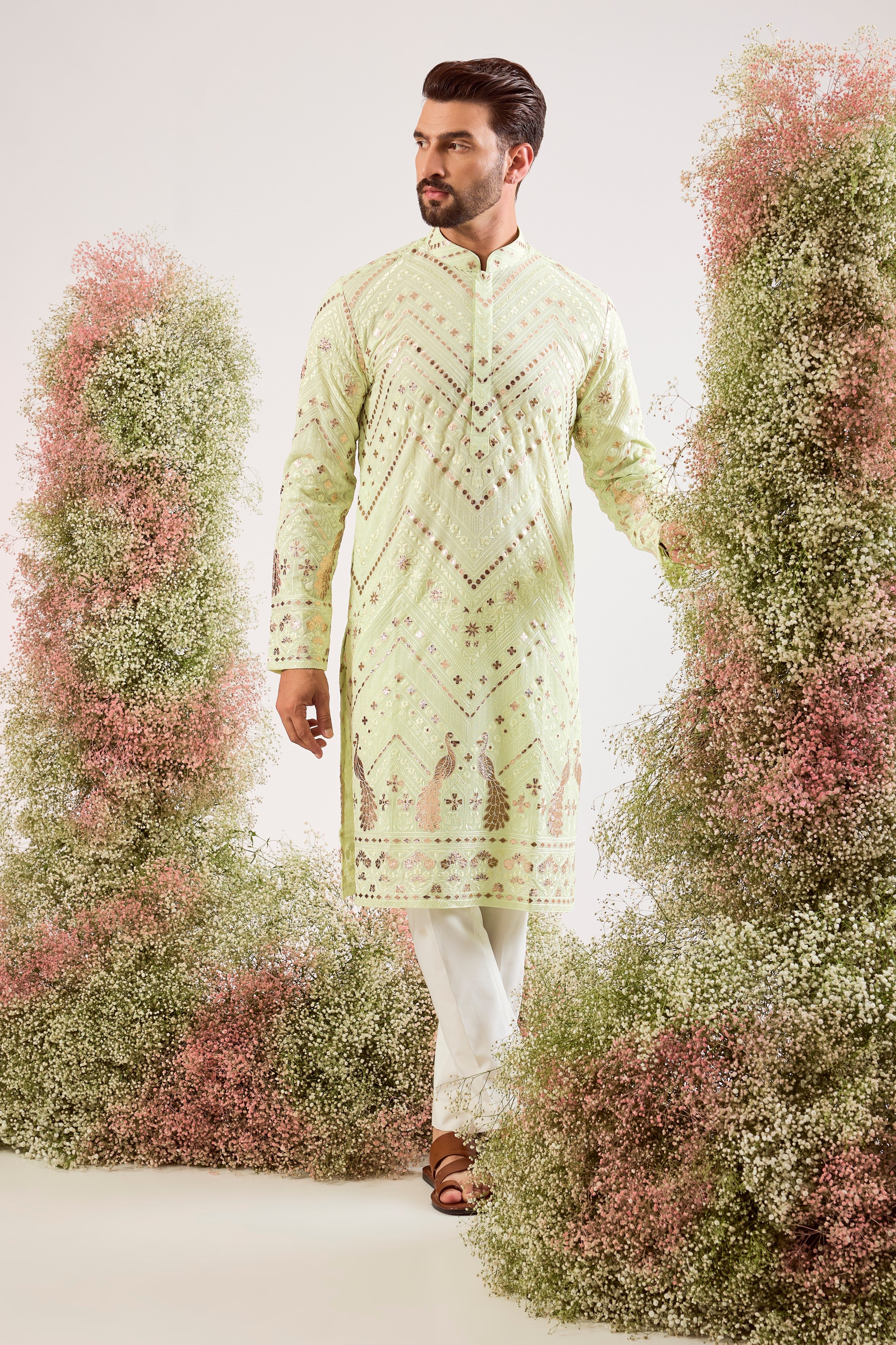 pastel green leather patchowk kurta with intricate peacock motifs