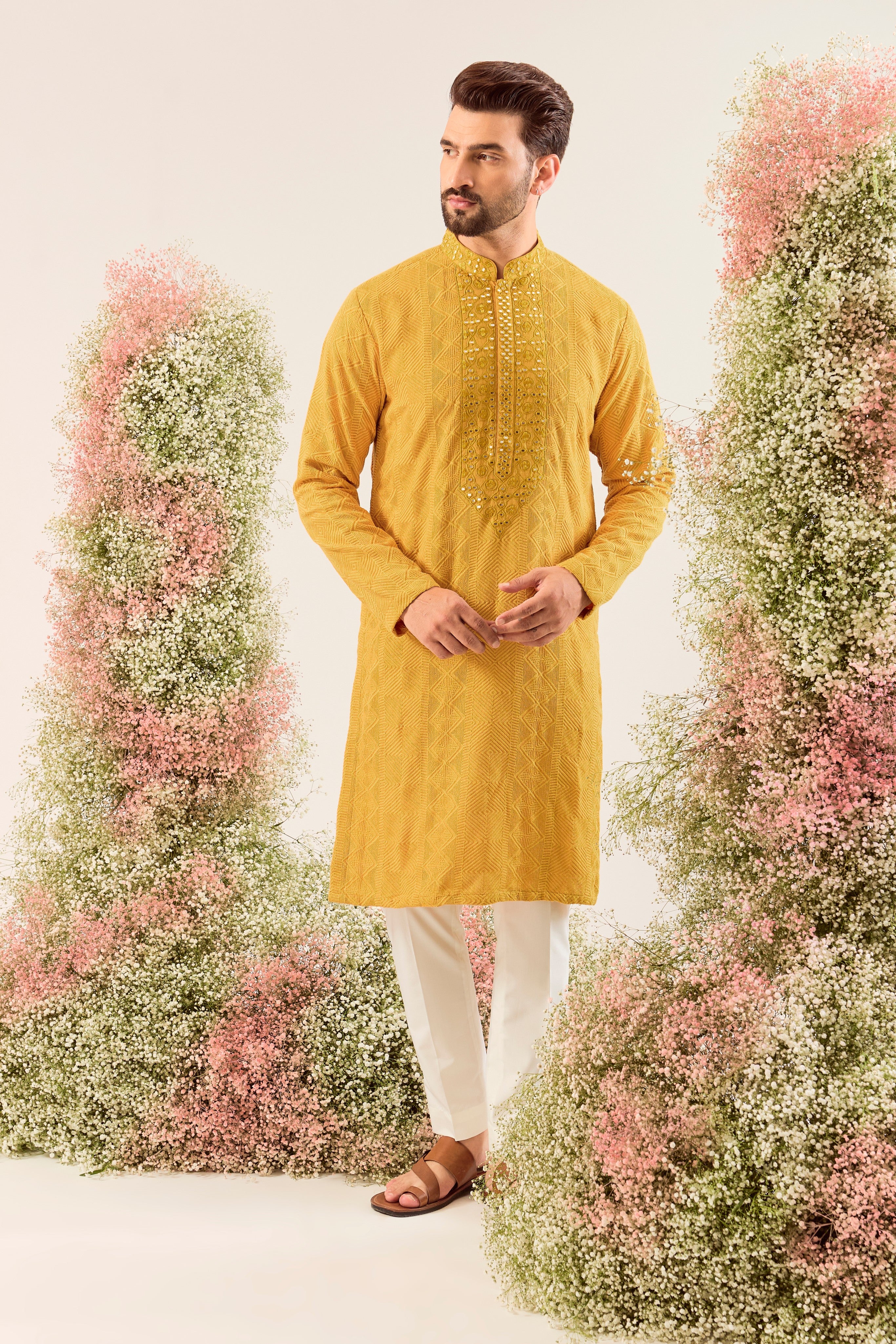 mustard chikankari kurta with intricately hand done mirror work neckline