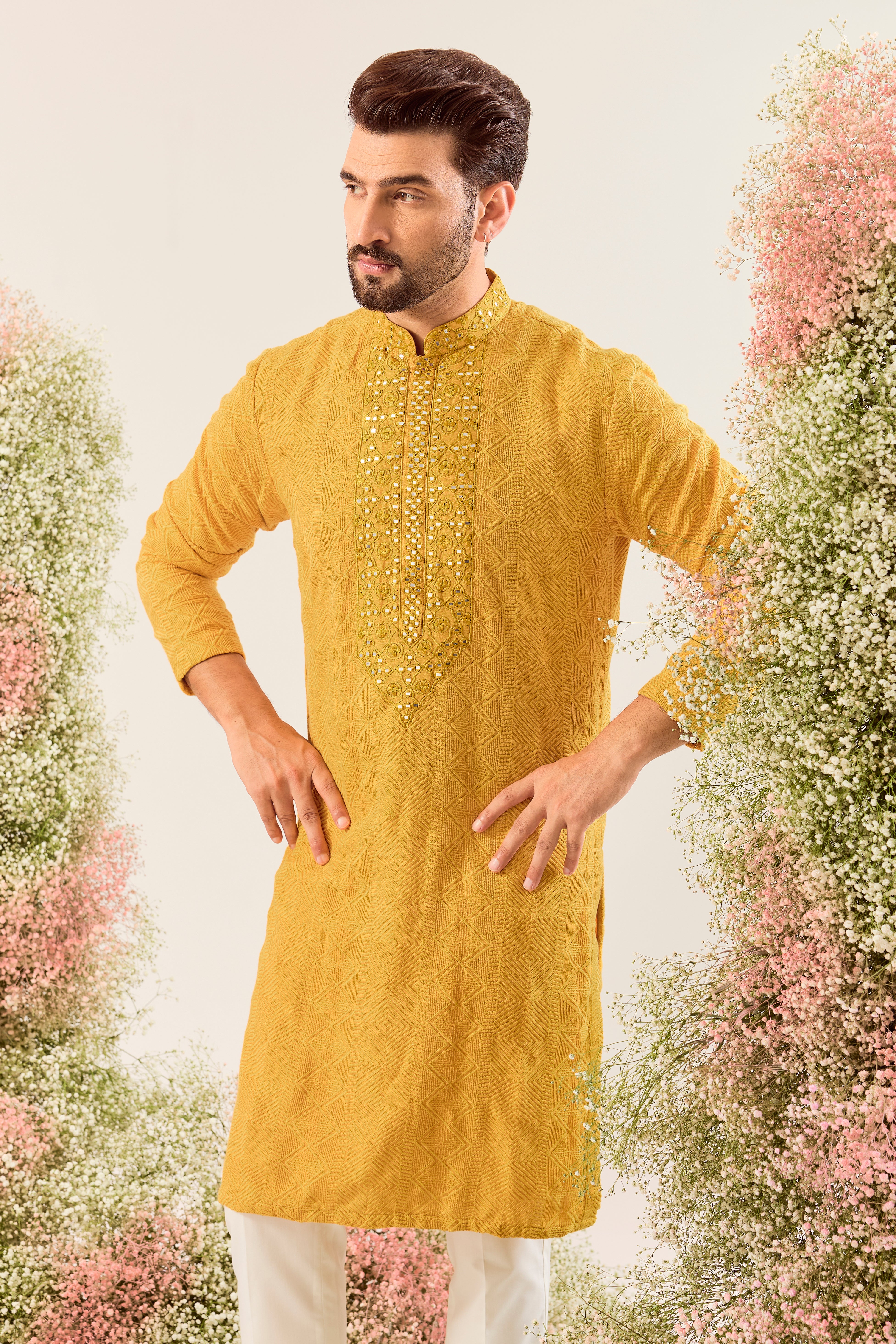 mustard chikankari kurta with intricately hand done mirror work neckline