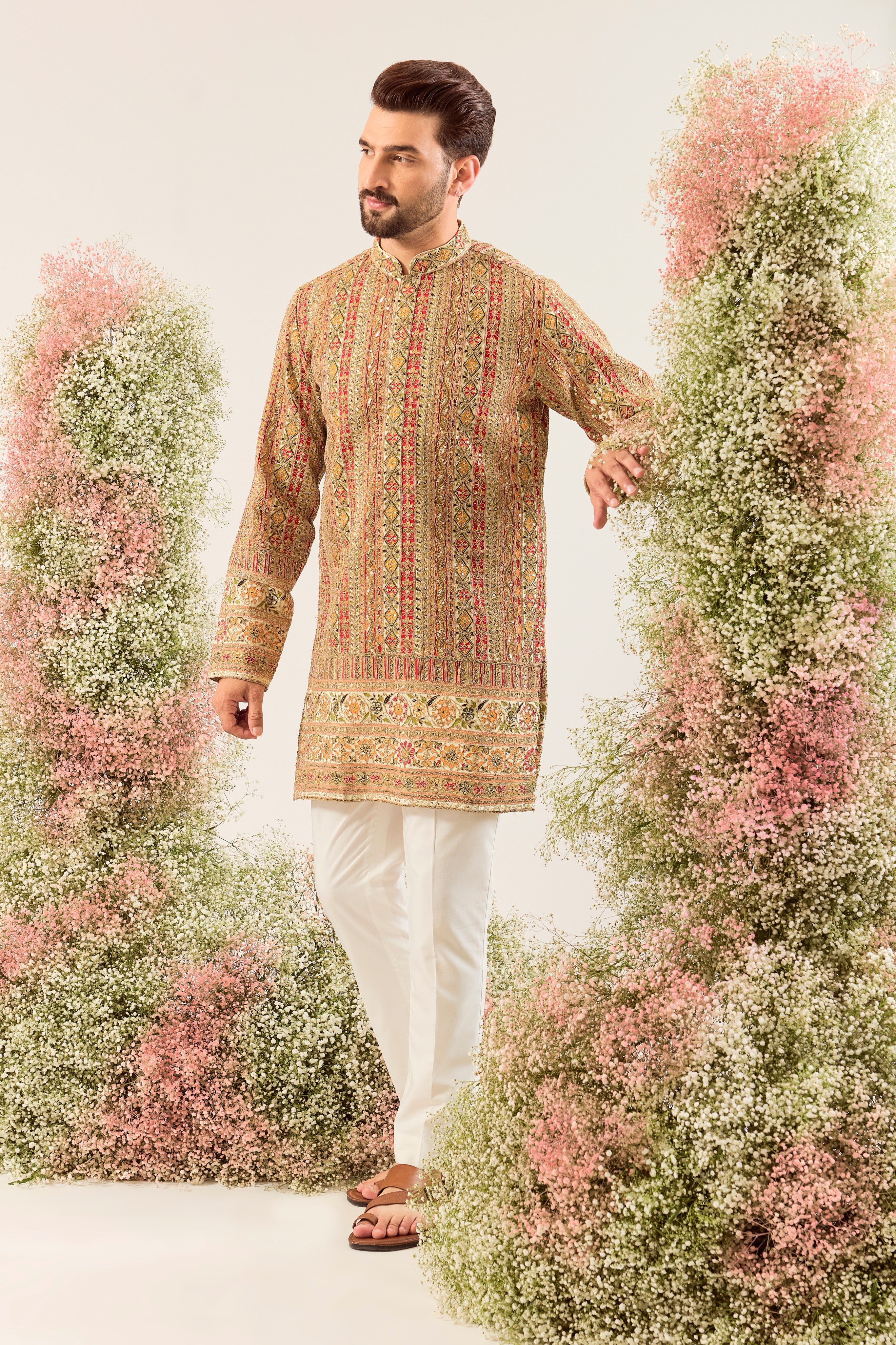 ivory/multi coloured short kurta with intricate zari work