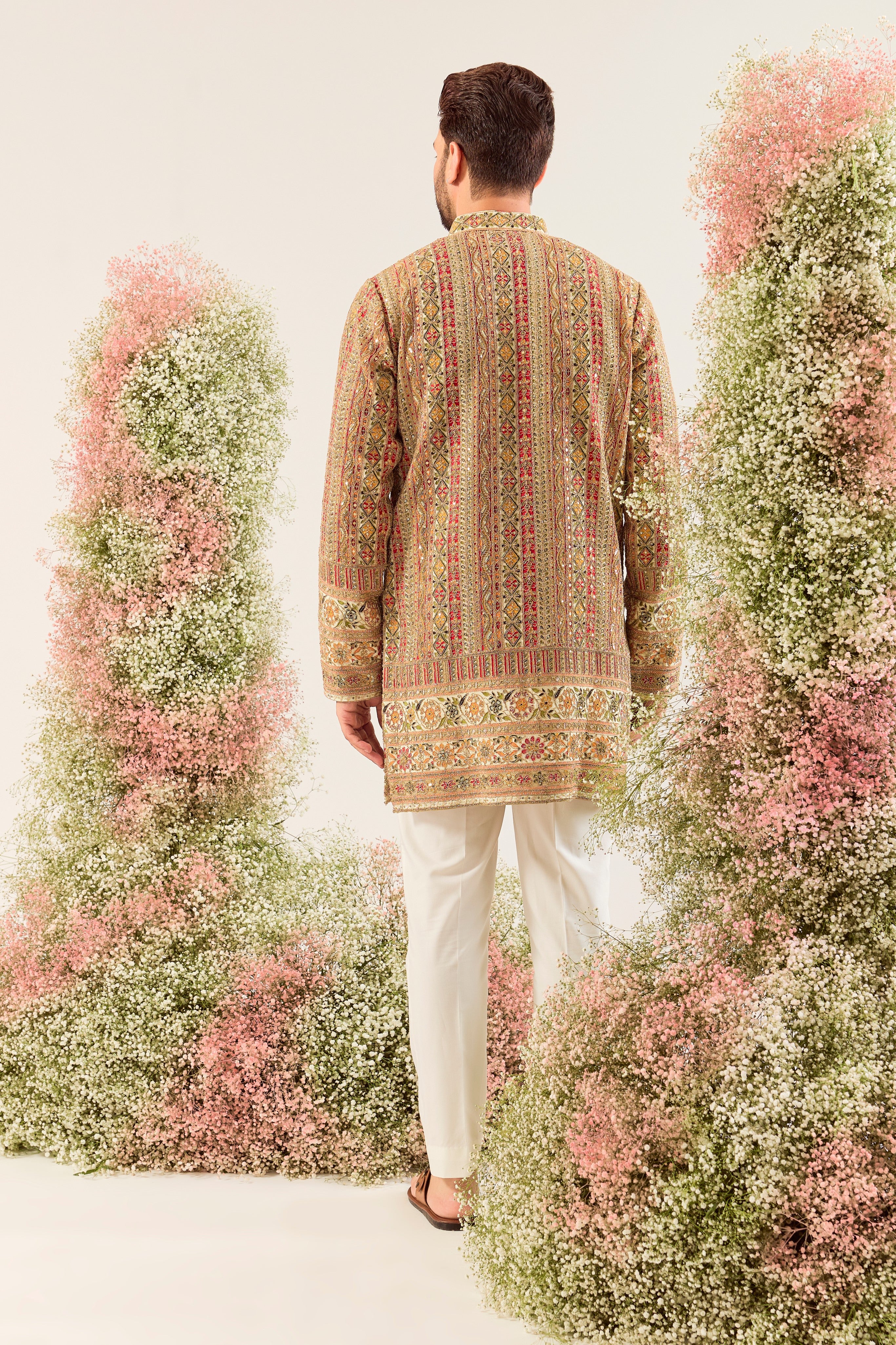 ivory/multi coloured short kurta with intricate zari work