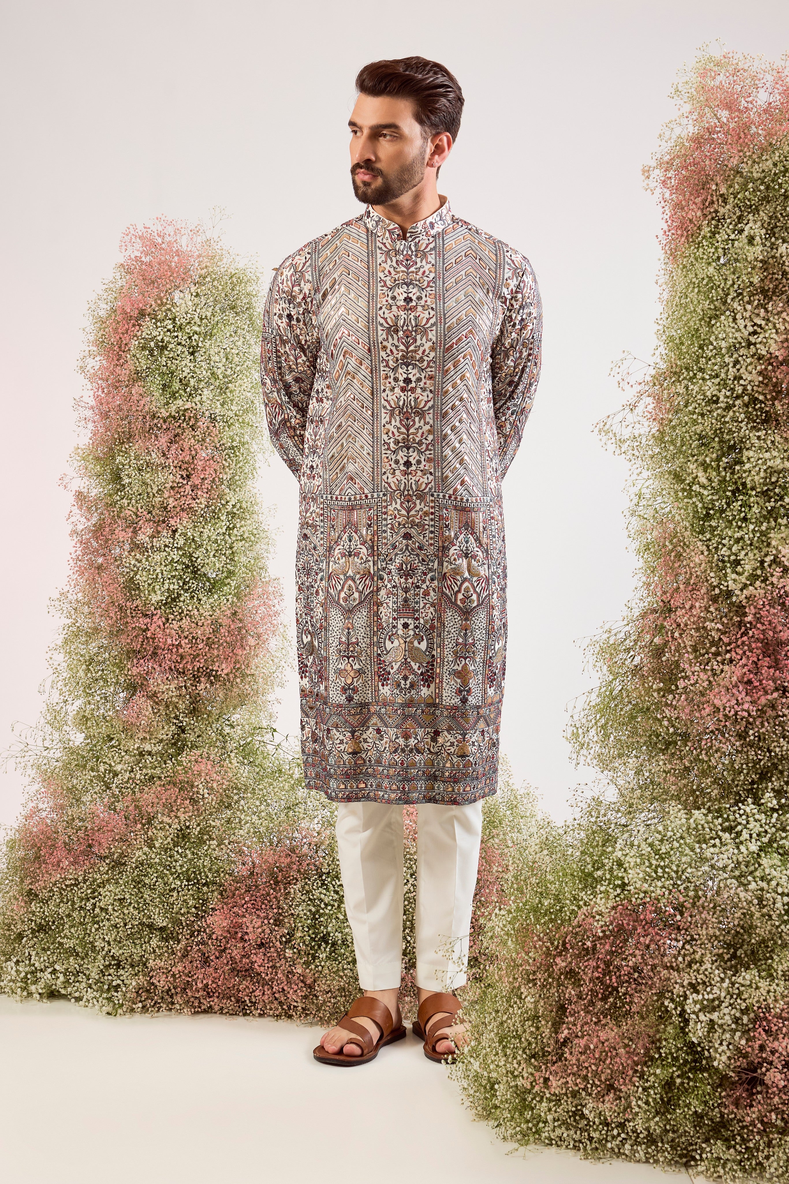 white leather patchwork kurta with intricate flora and fauna embroidery