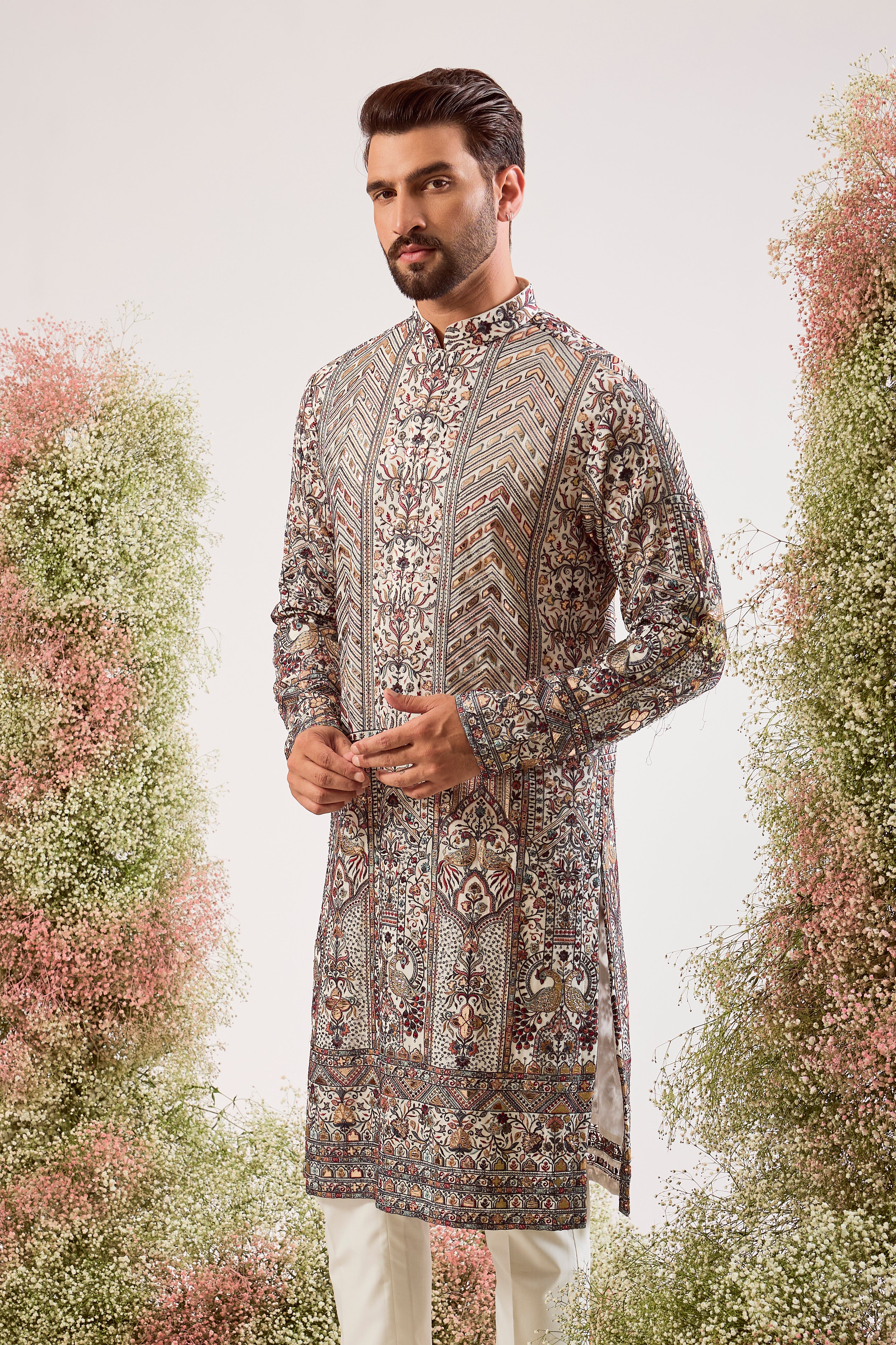 white leather patchwork kurta with intricate flora and fauna embroidery