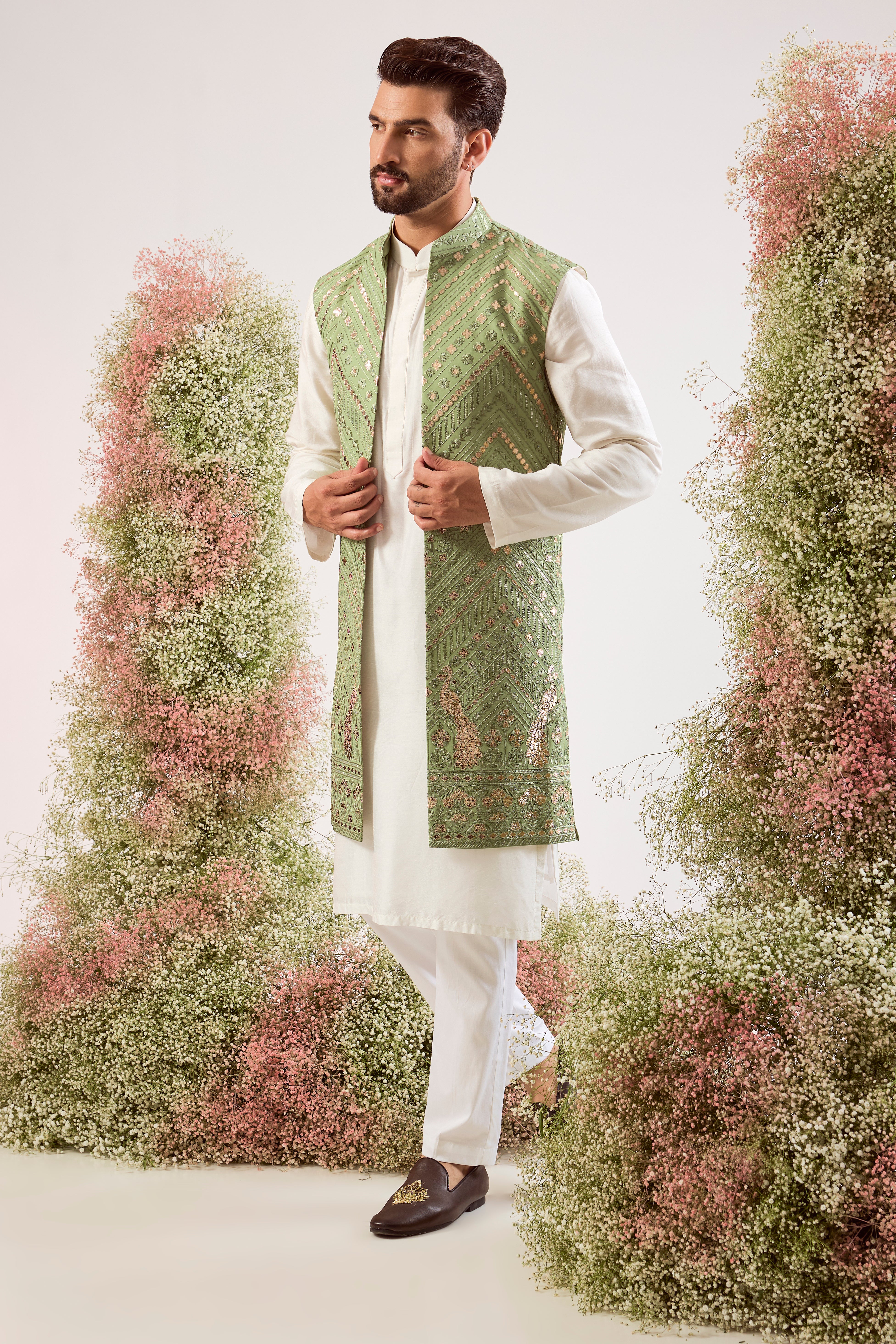 sage green leather patchwork long open jacket with peacock motifs
