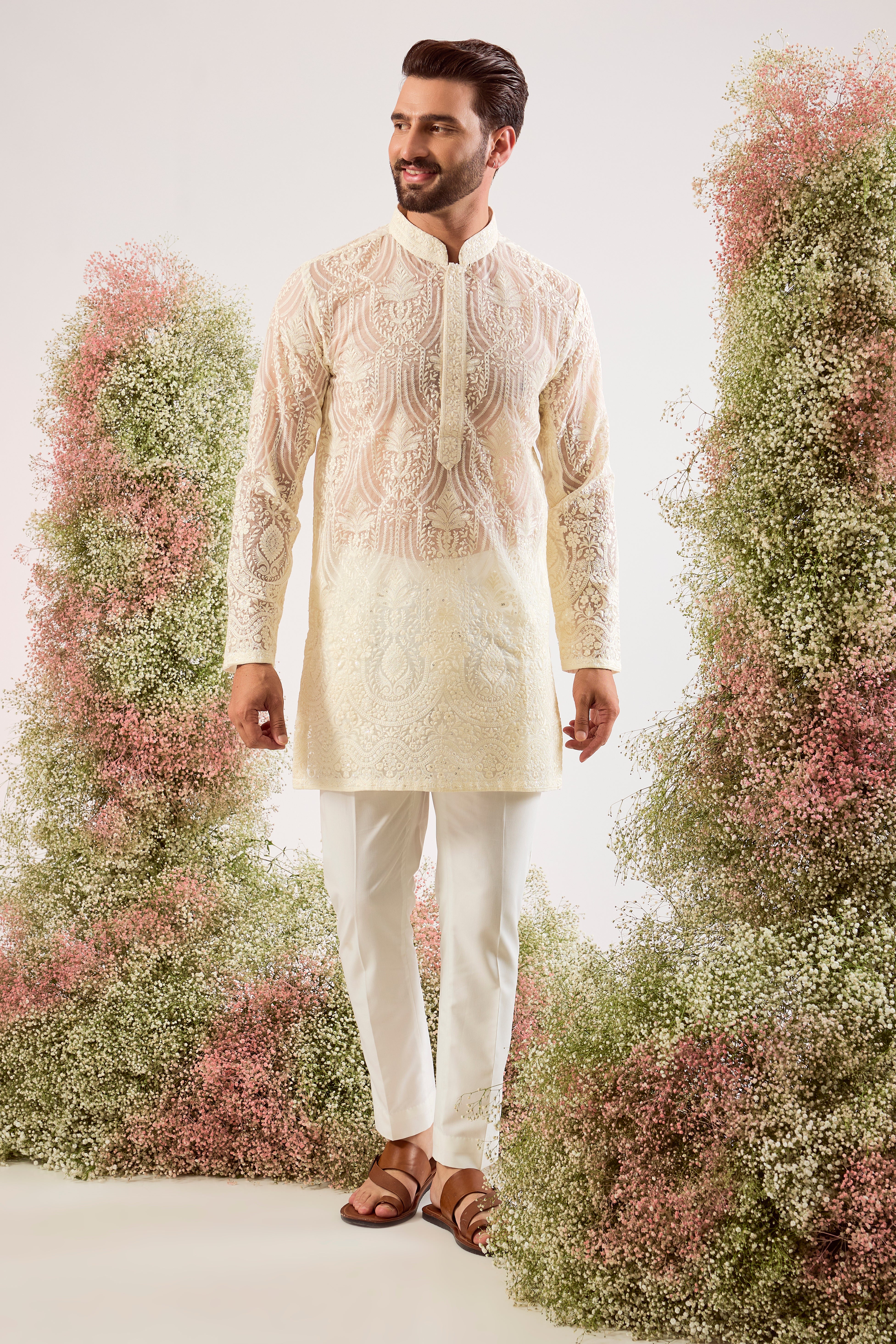 white  short see through chickankari kurta with intricate sequin embroidery