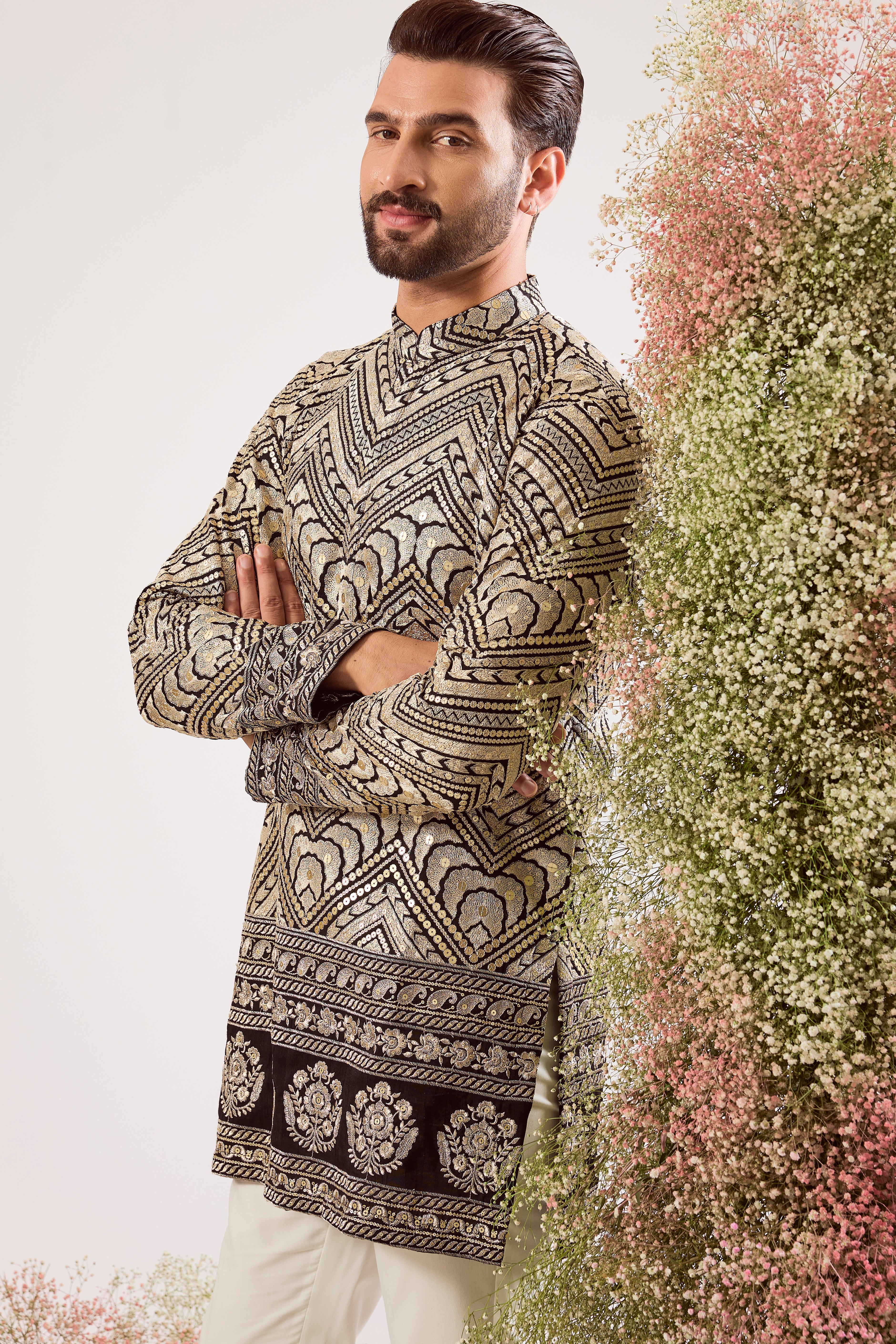 black short zari kurta with golden thread work and sequin details