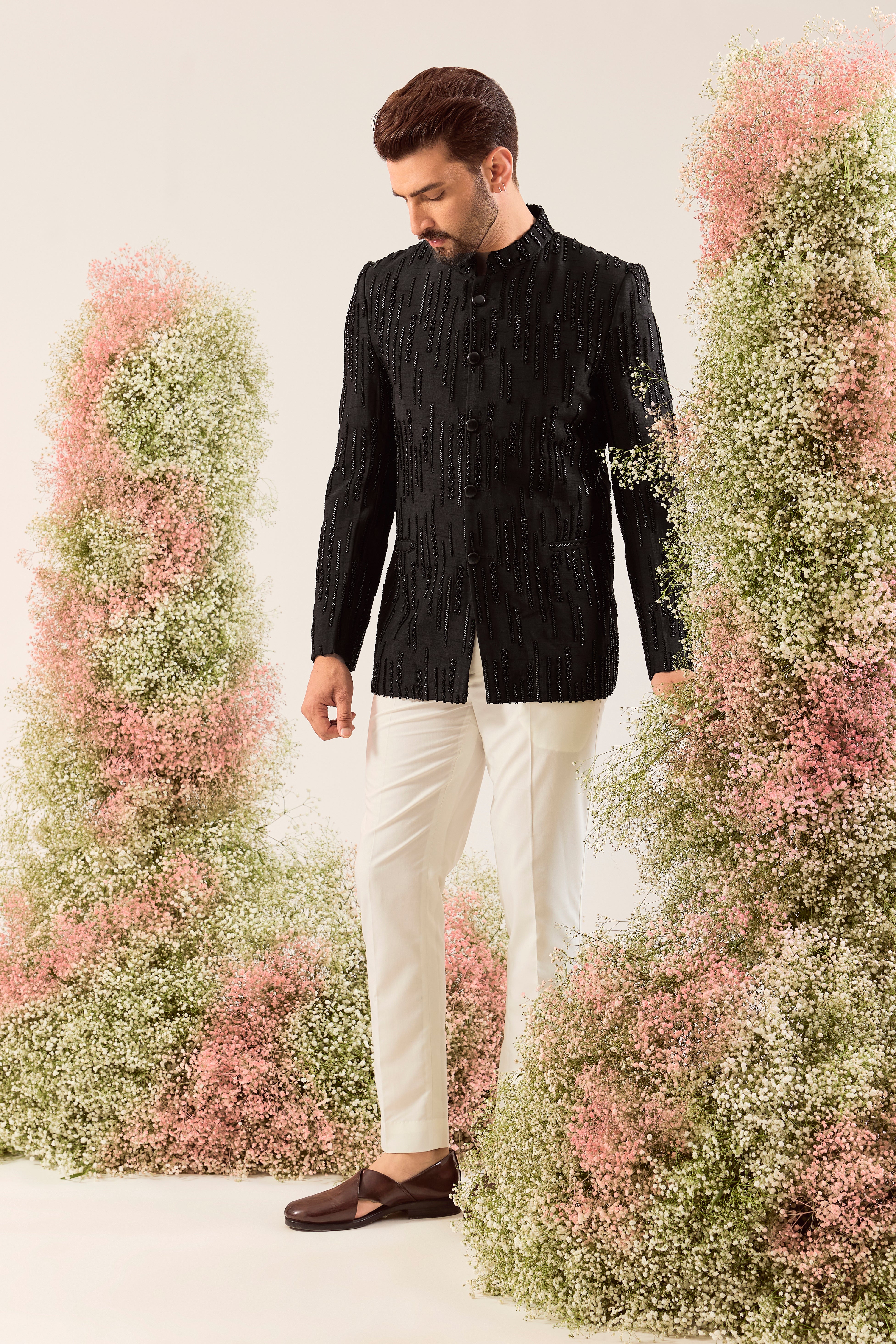 black signature bandgala with intricate cut dana work