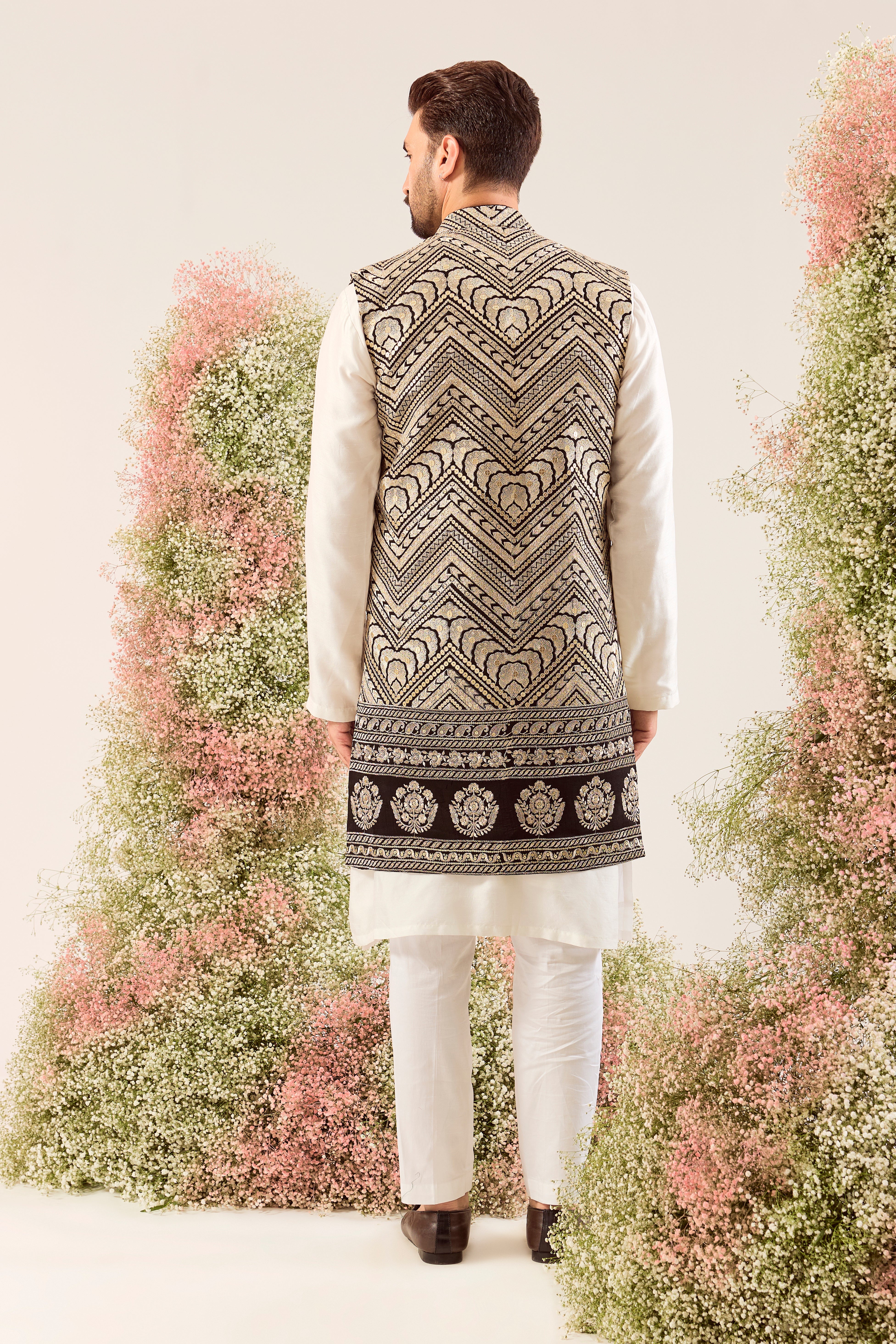 black long open jacket with golden thread work and heavy zari work