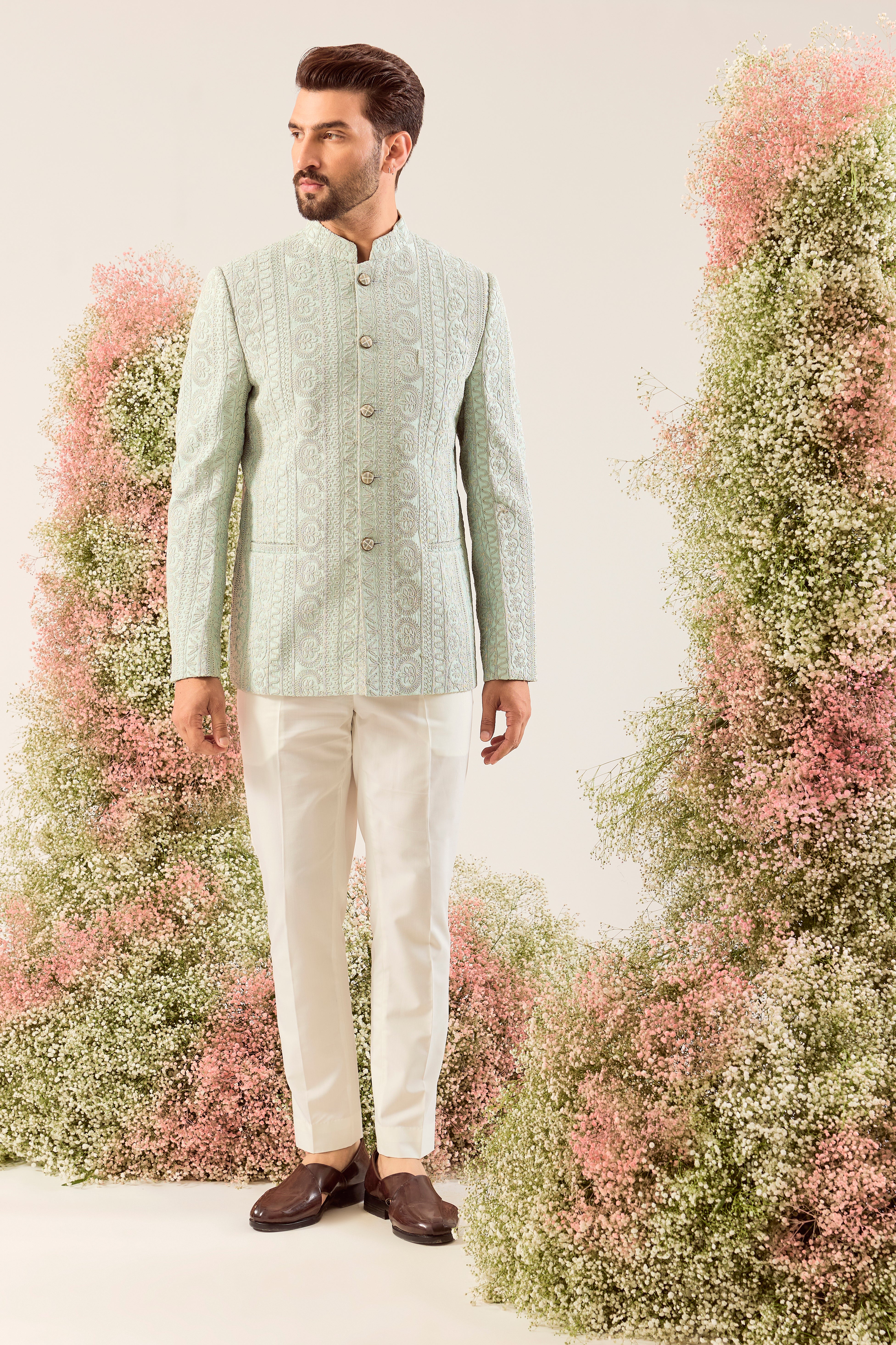 aqua/green short bandgala with intricate  doorhi work