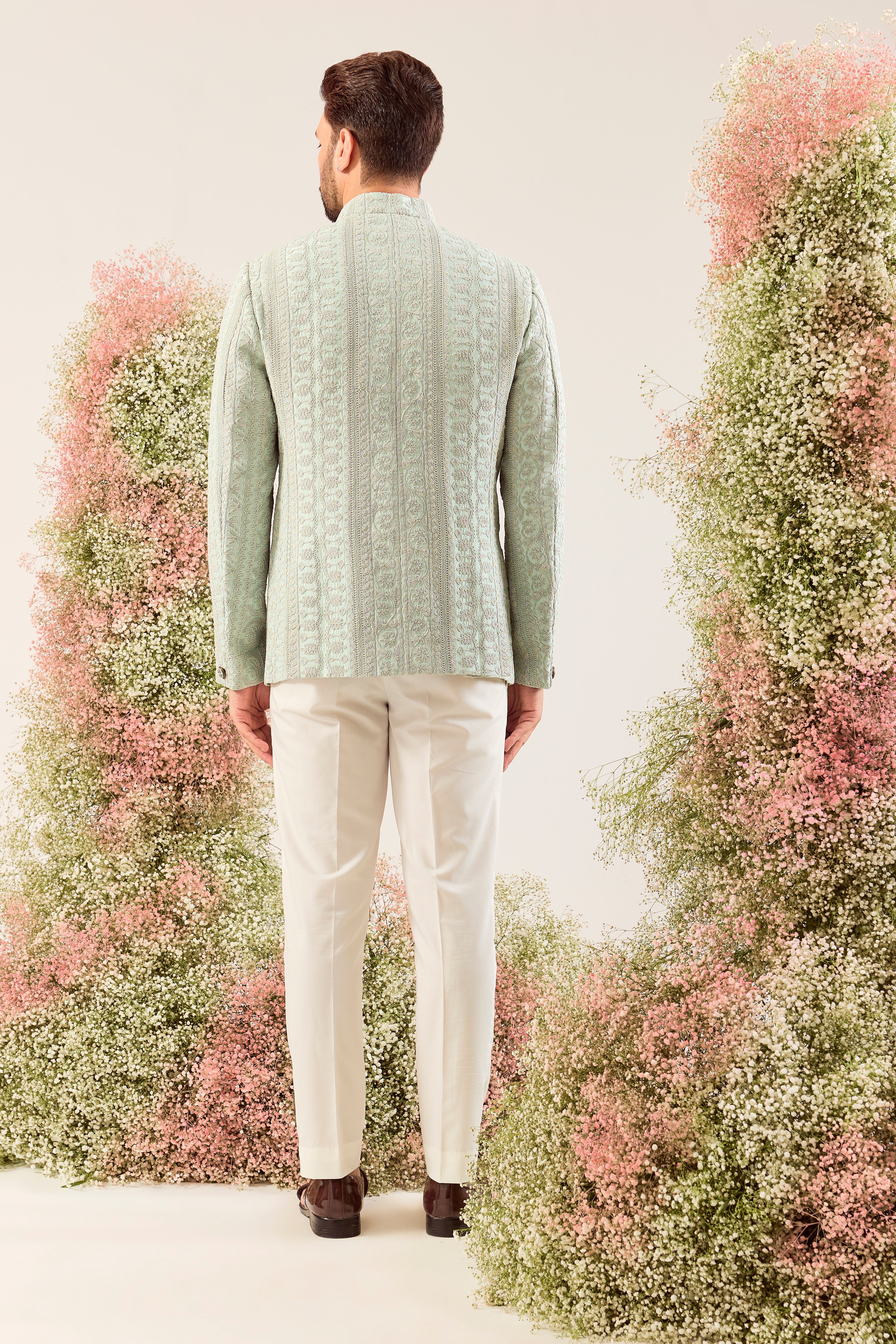 aqua/green short bandgala with intricate  doorhi work