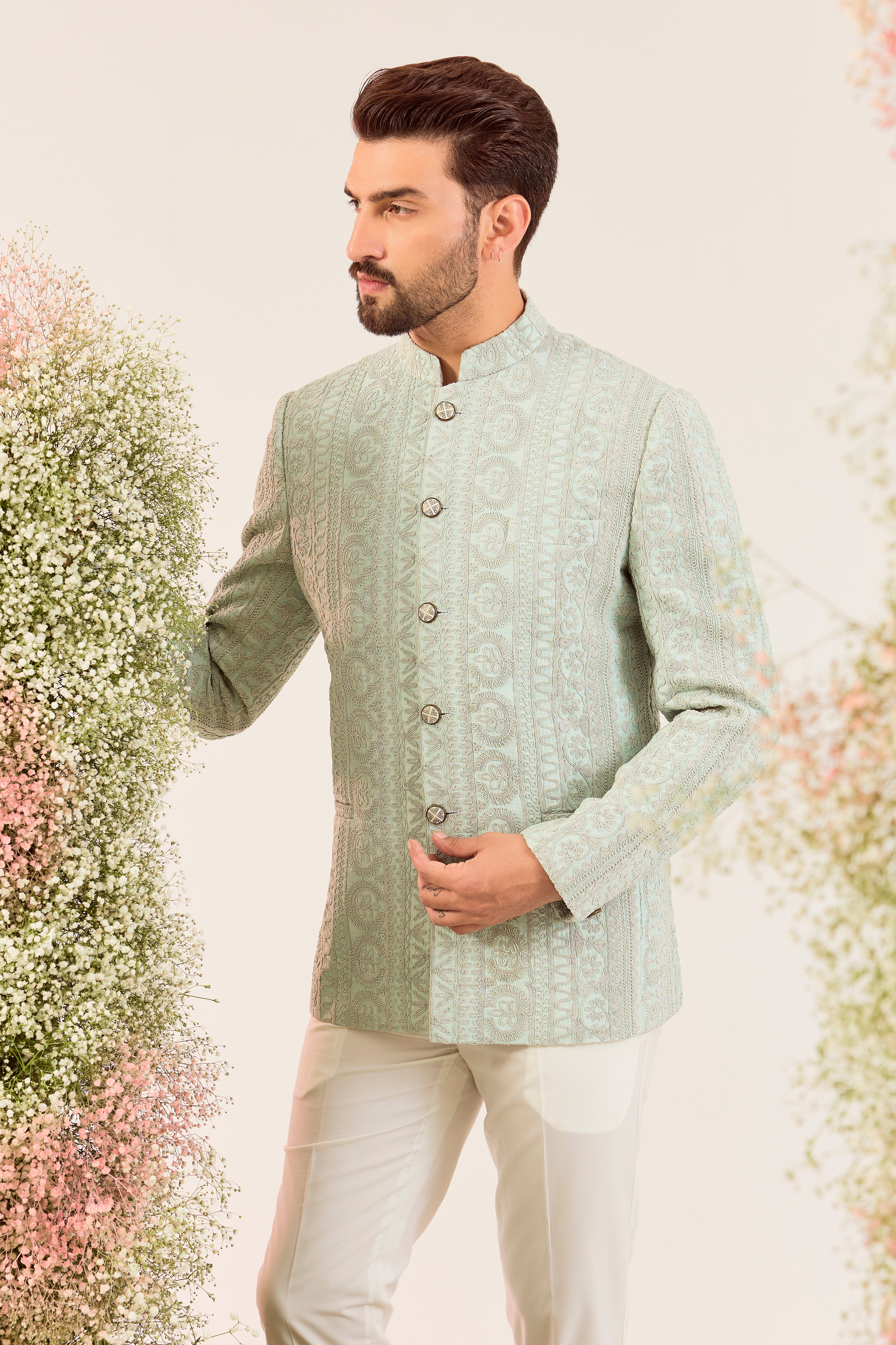 aqua/green short bandgala with intricate  doorhi work