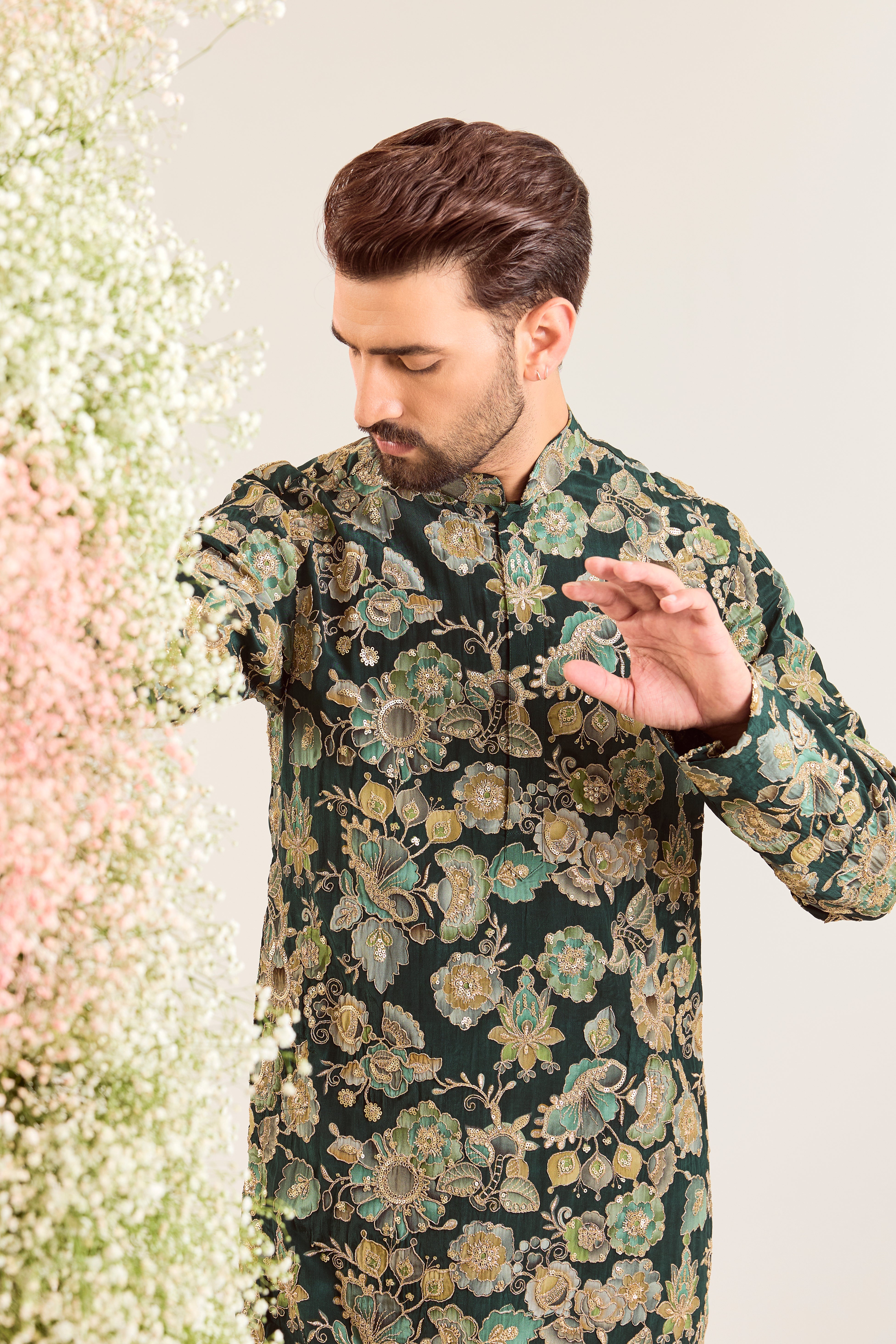 green long kurta with intricate floral embroidery done with deatiled zari & sequin