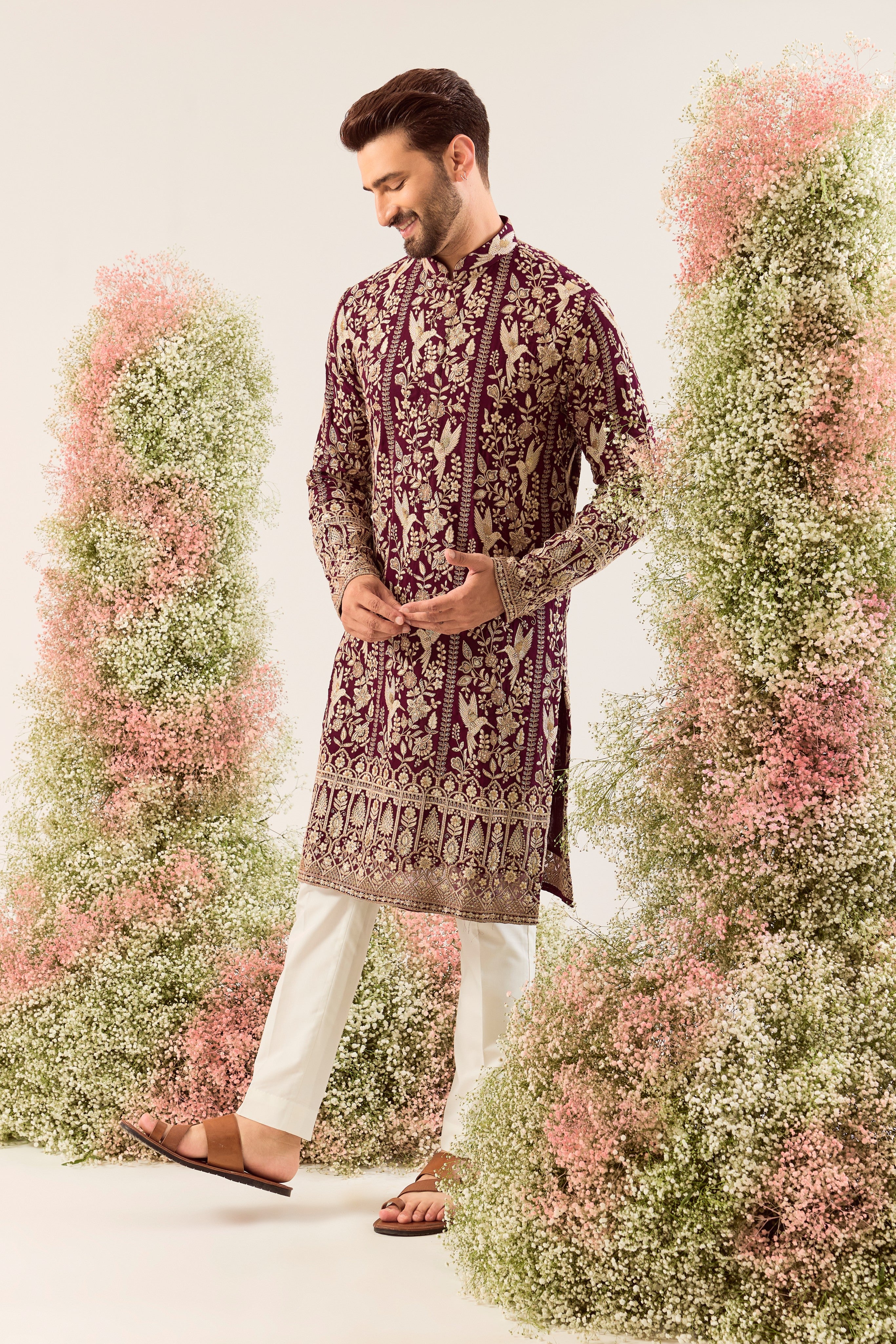 wine chikankari kurta with intriacte flora and fauna decorated with sequin