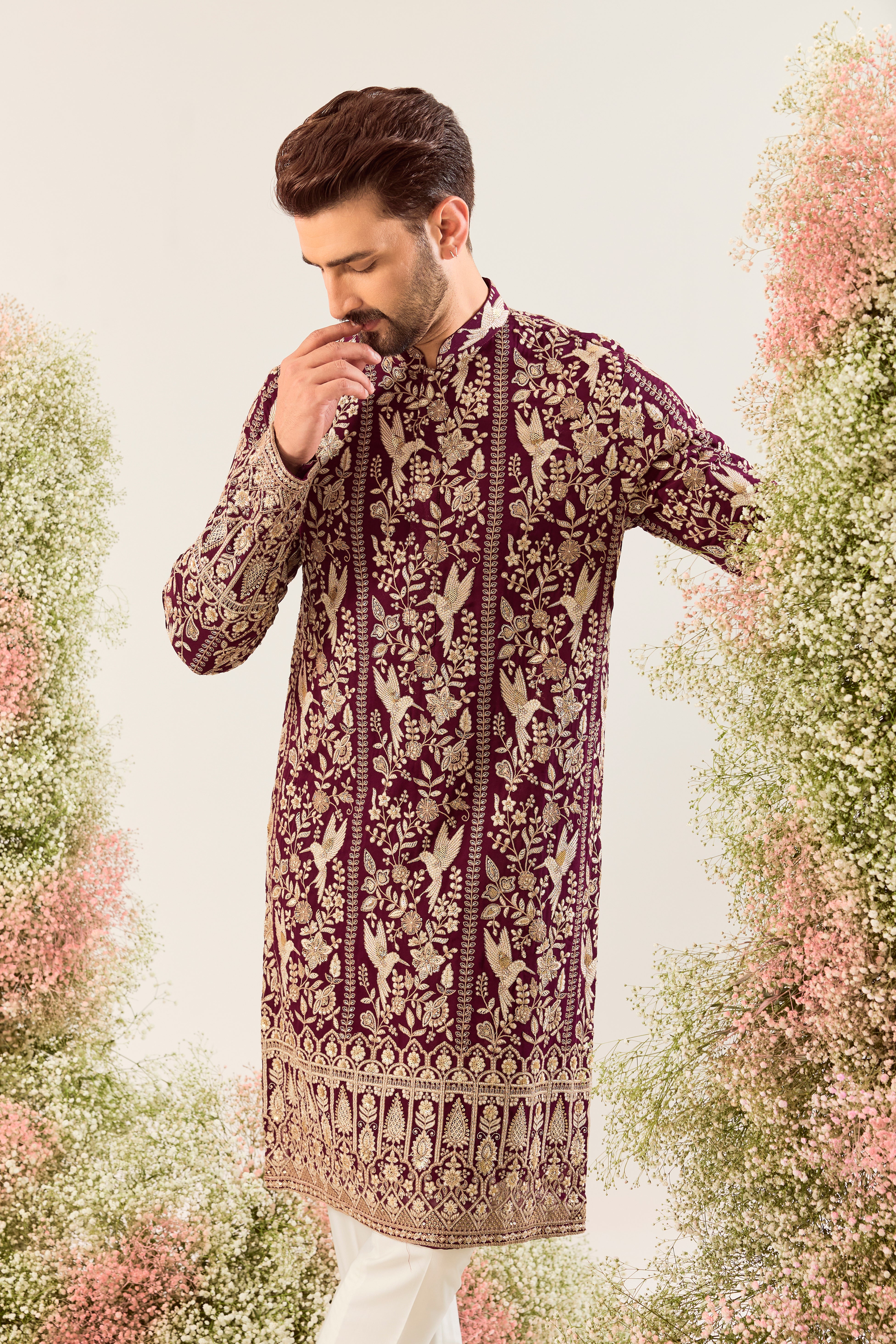 wine chikankari kurta with intriacte flora and fauna decorated with sequin