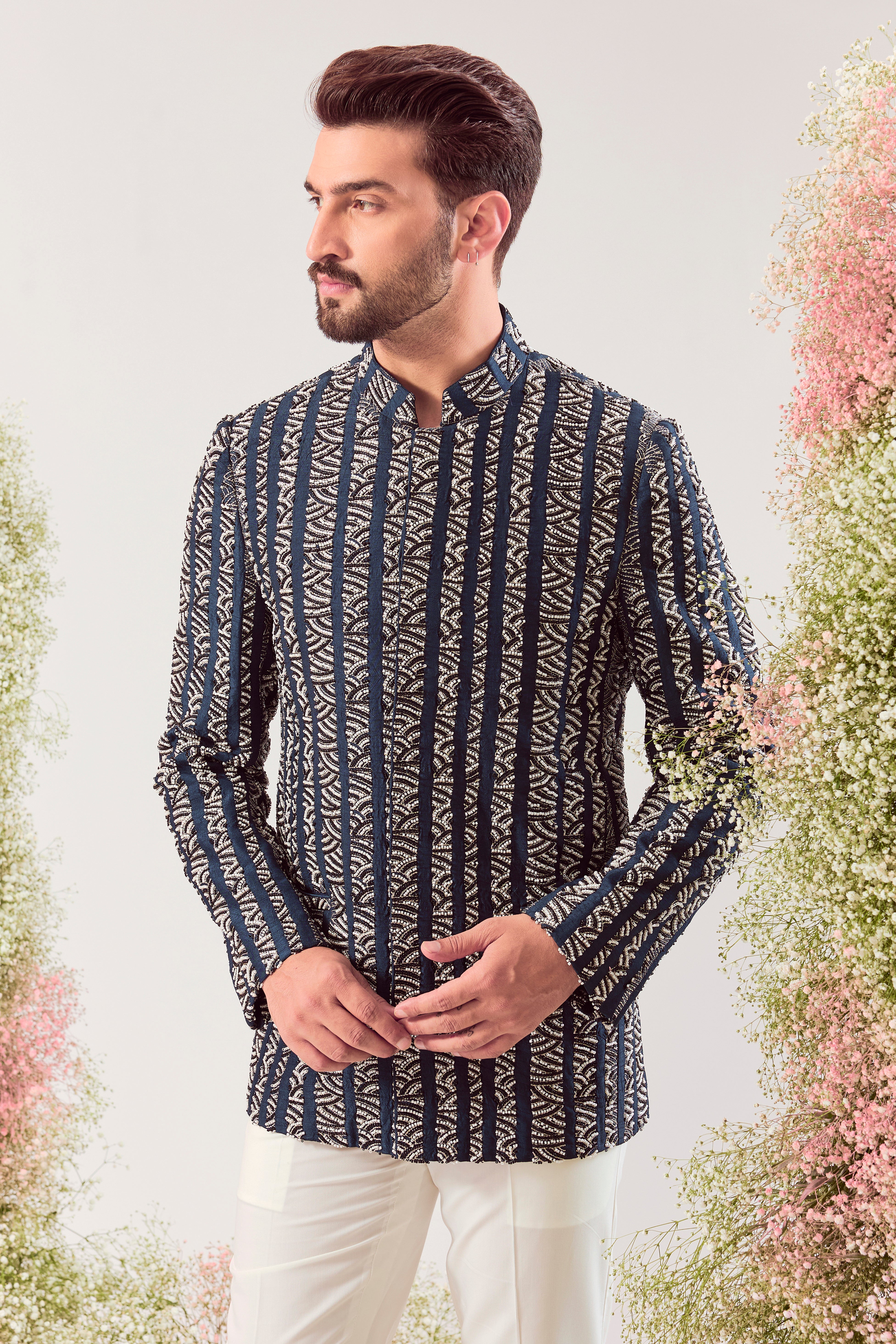 Our signature navy blue bandgala with intricate black and white bead work