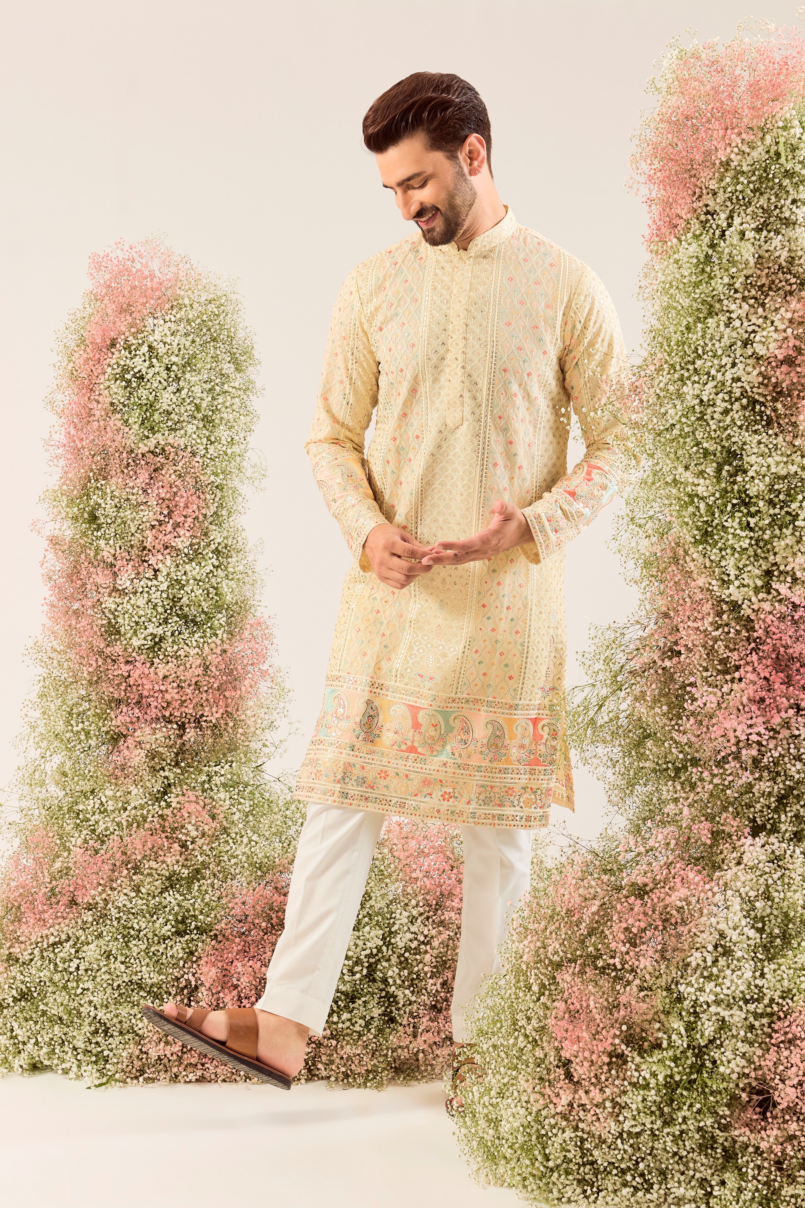 cream  chikankari kurta with intricate multi colour threadwork and paisley emboridery