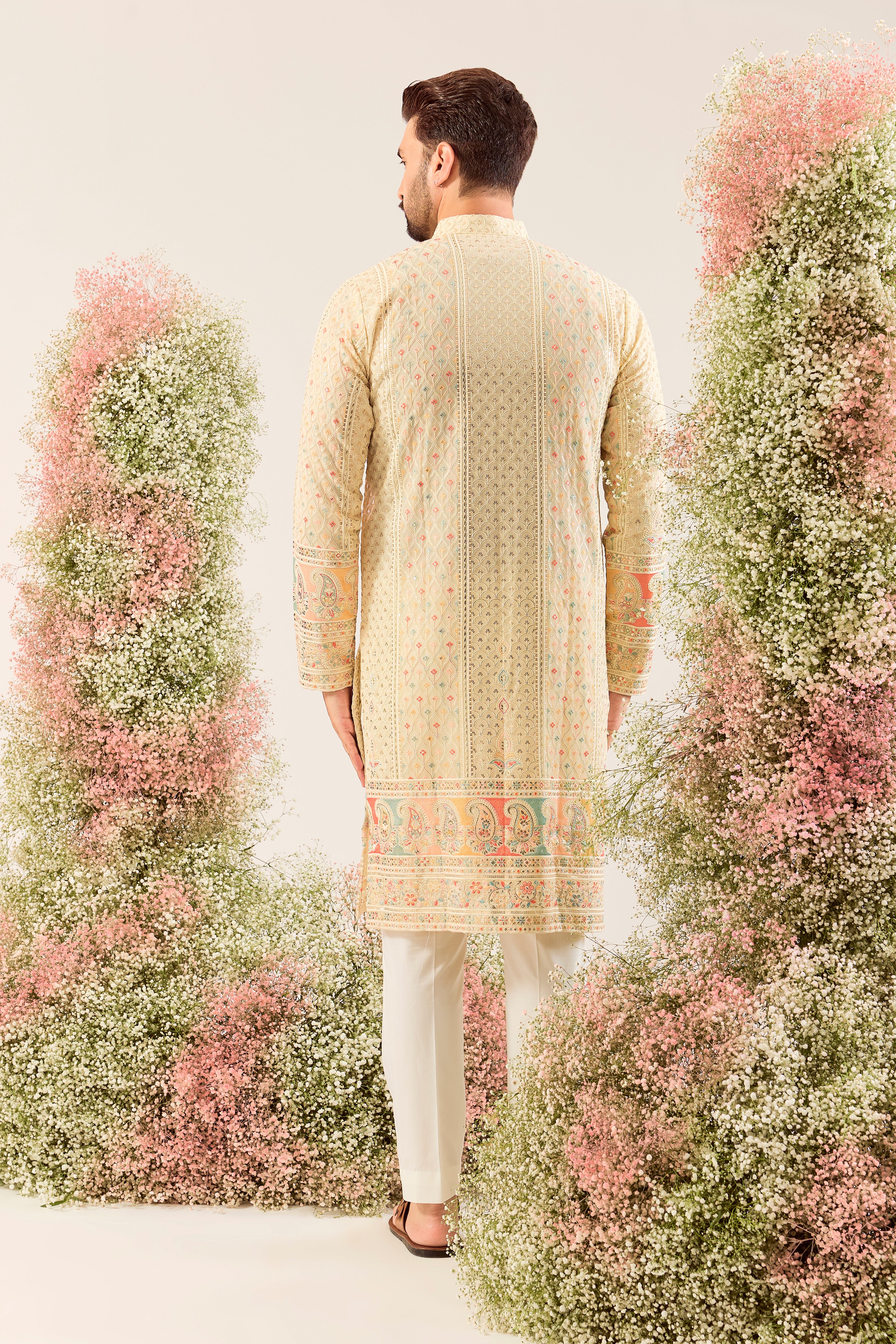 cream  chikankari kurta with intricate multi colour threadwork and paisley emboridery