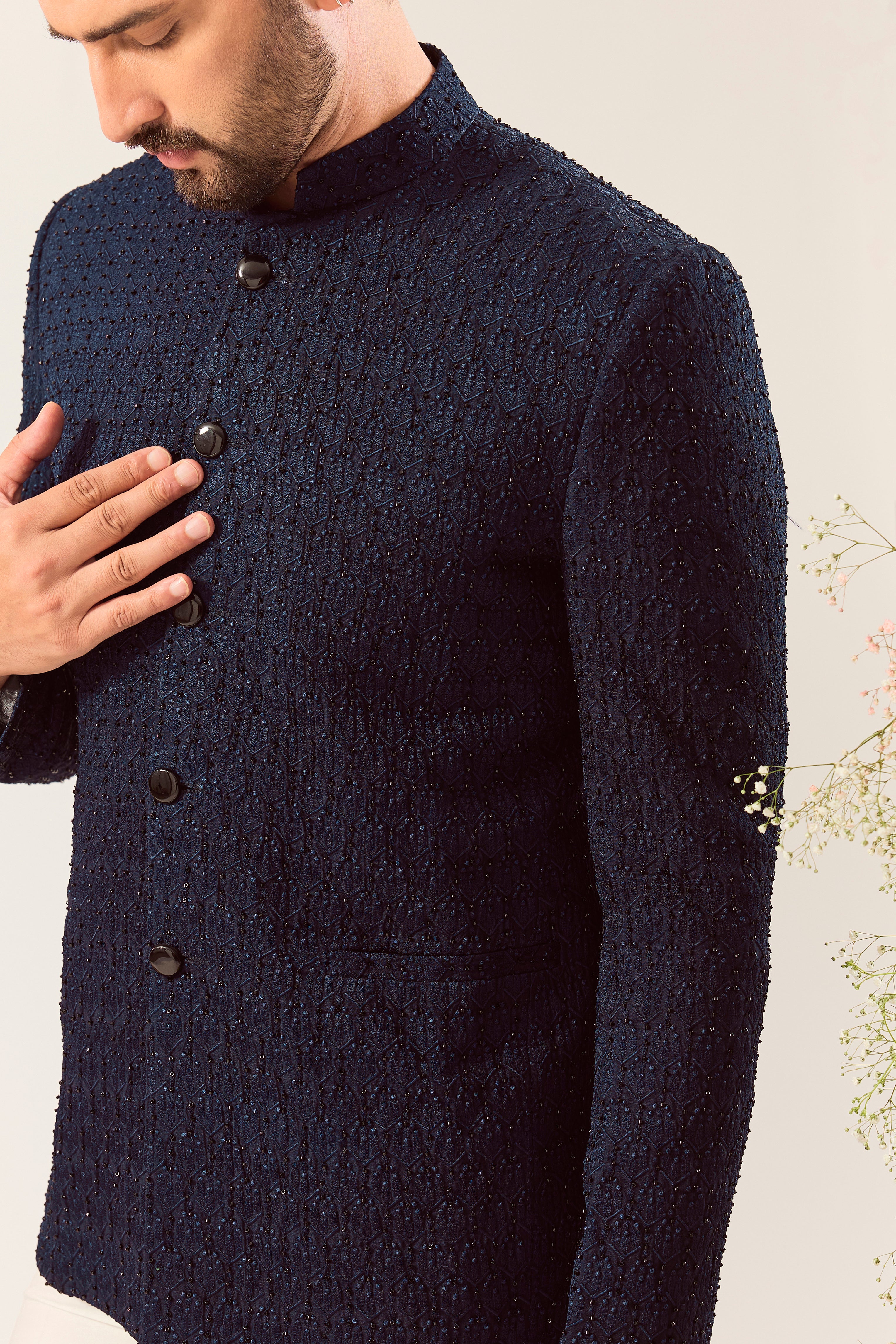 navy blue bandgala with intricate thread work and cut dana