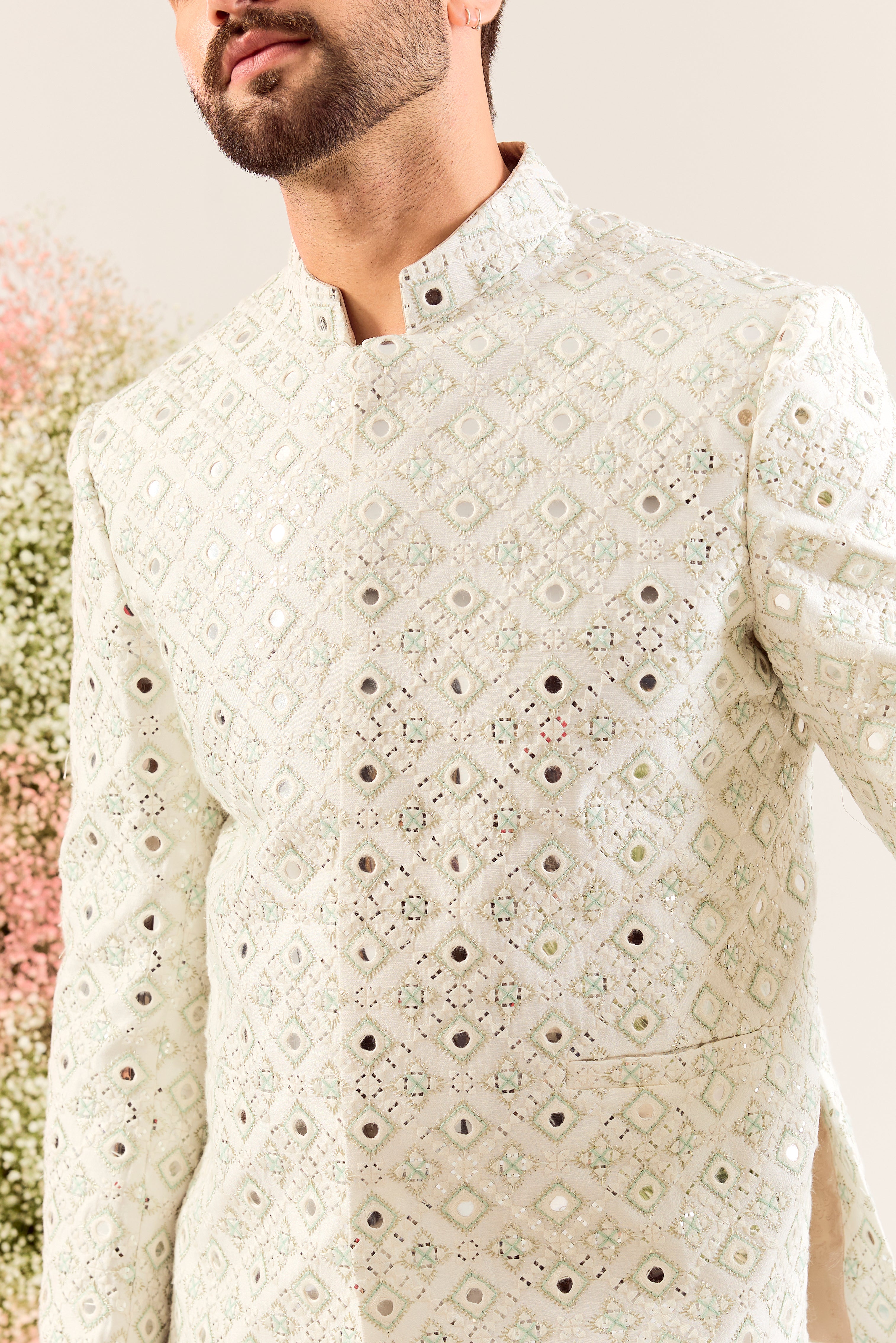 our signature white mirror work bandgala with intricate aqua thread work and sequin details