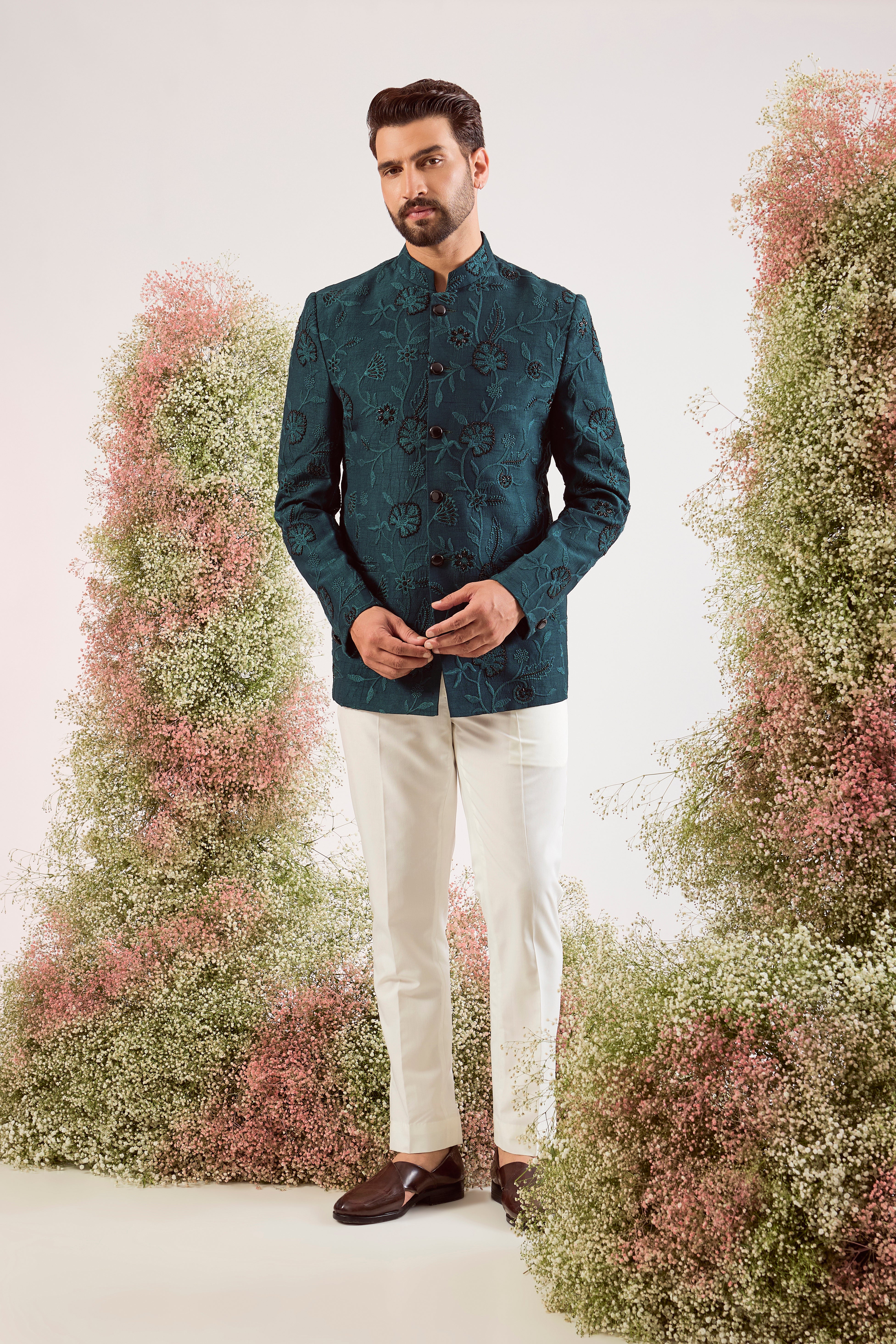 teal bandgala with intricate floral embroidery and sleek black cut dana work