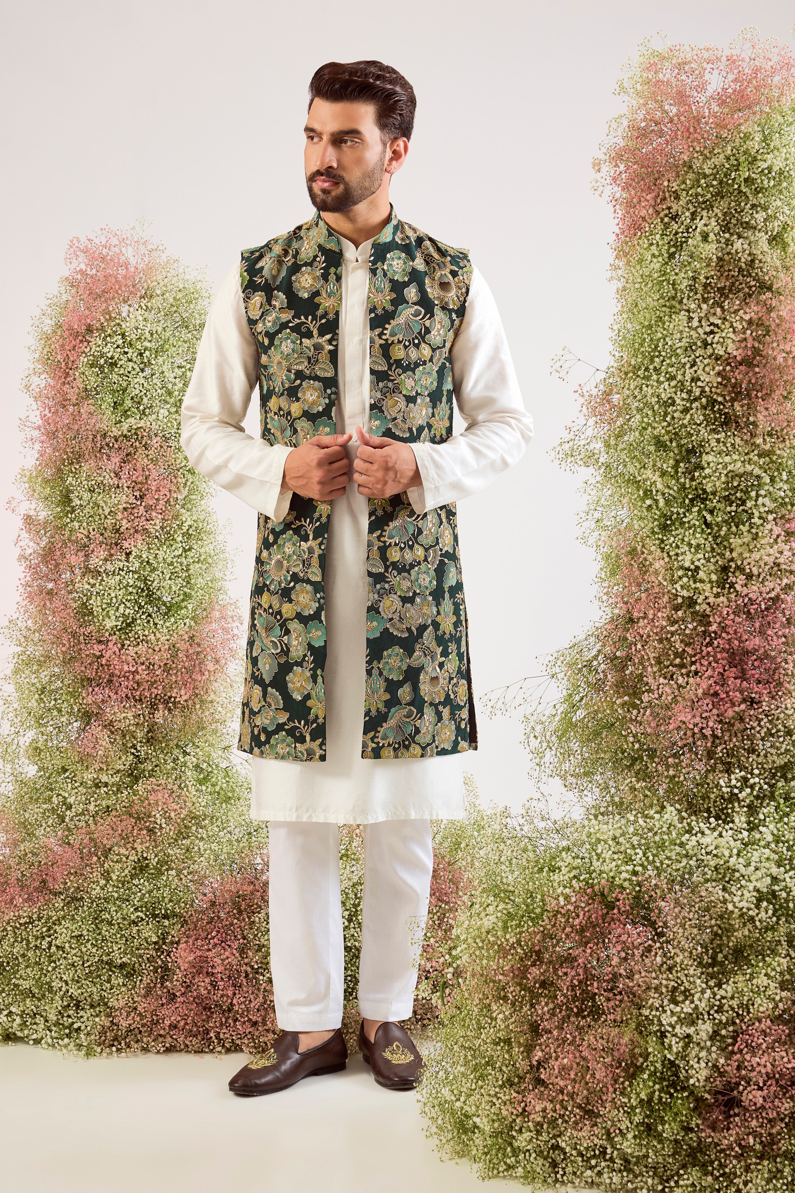 This magnificent green floral embroidered long open jacket is a masterpiece of timeless design and luxurious craftsmanship