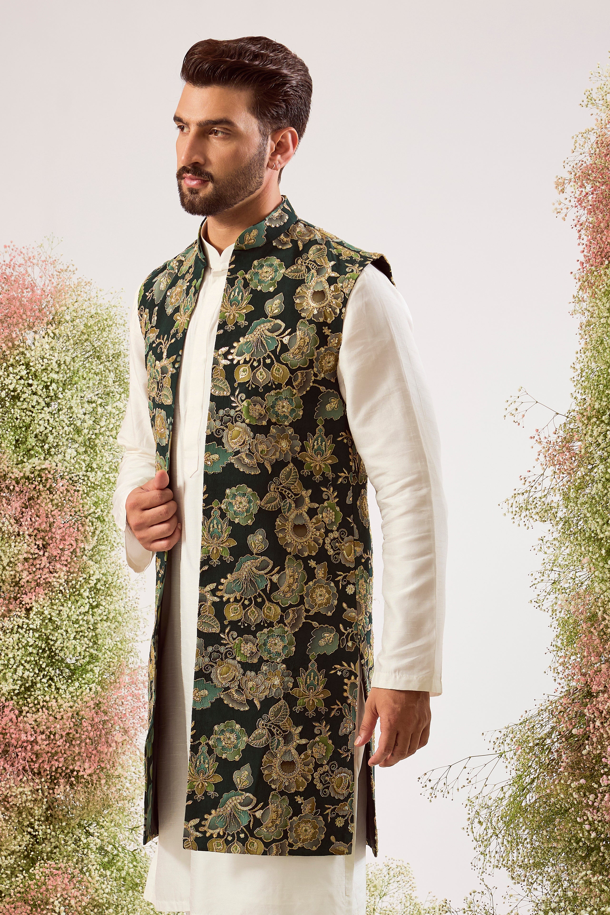 This magnificent green floral embroidered long open jacket is a masterpiece of timeless design and luxurious craftsmanship