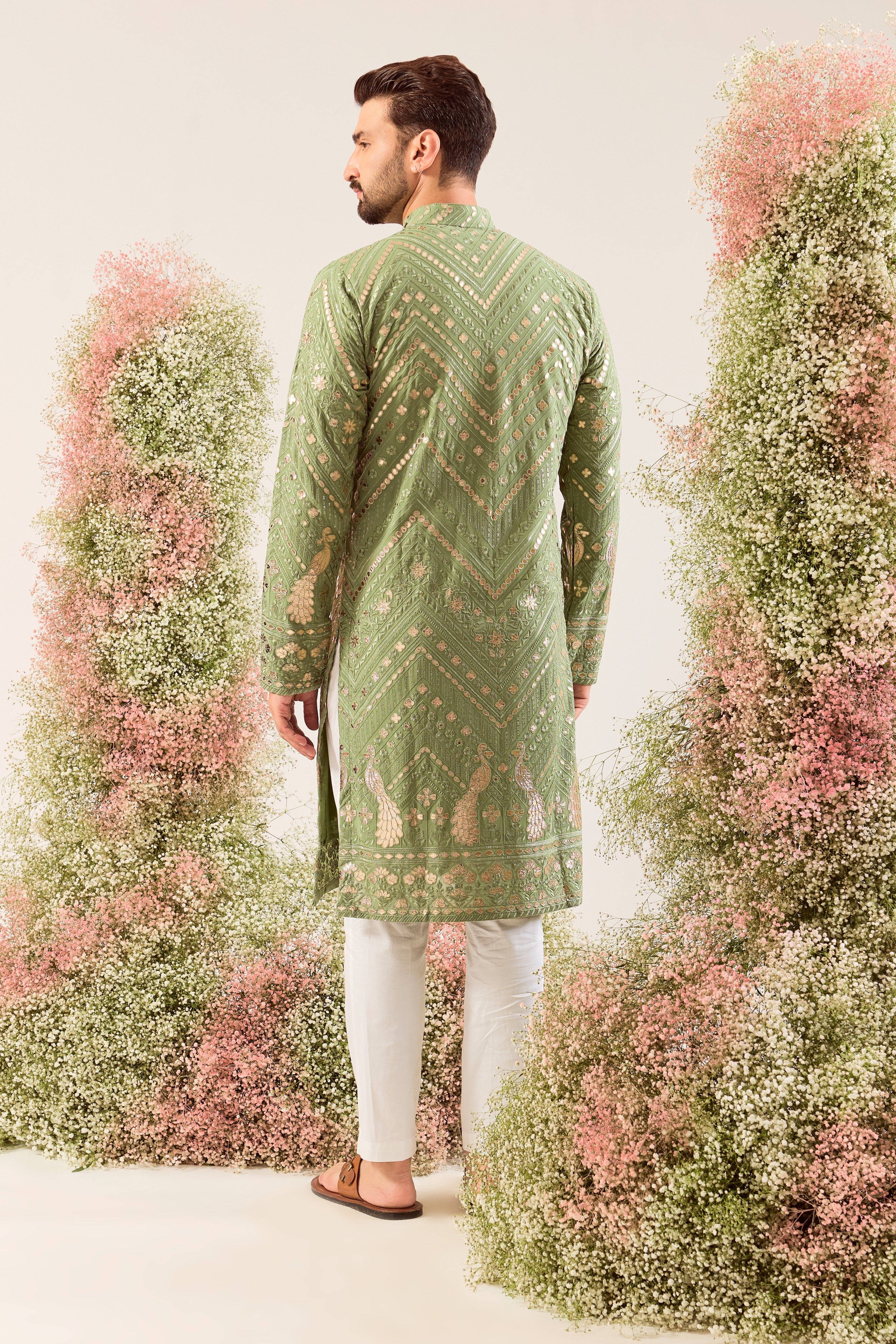 green leather patchwork kurta with intricate peacock motifs