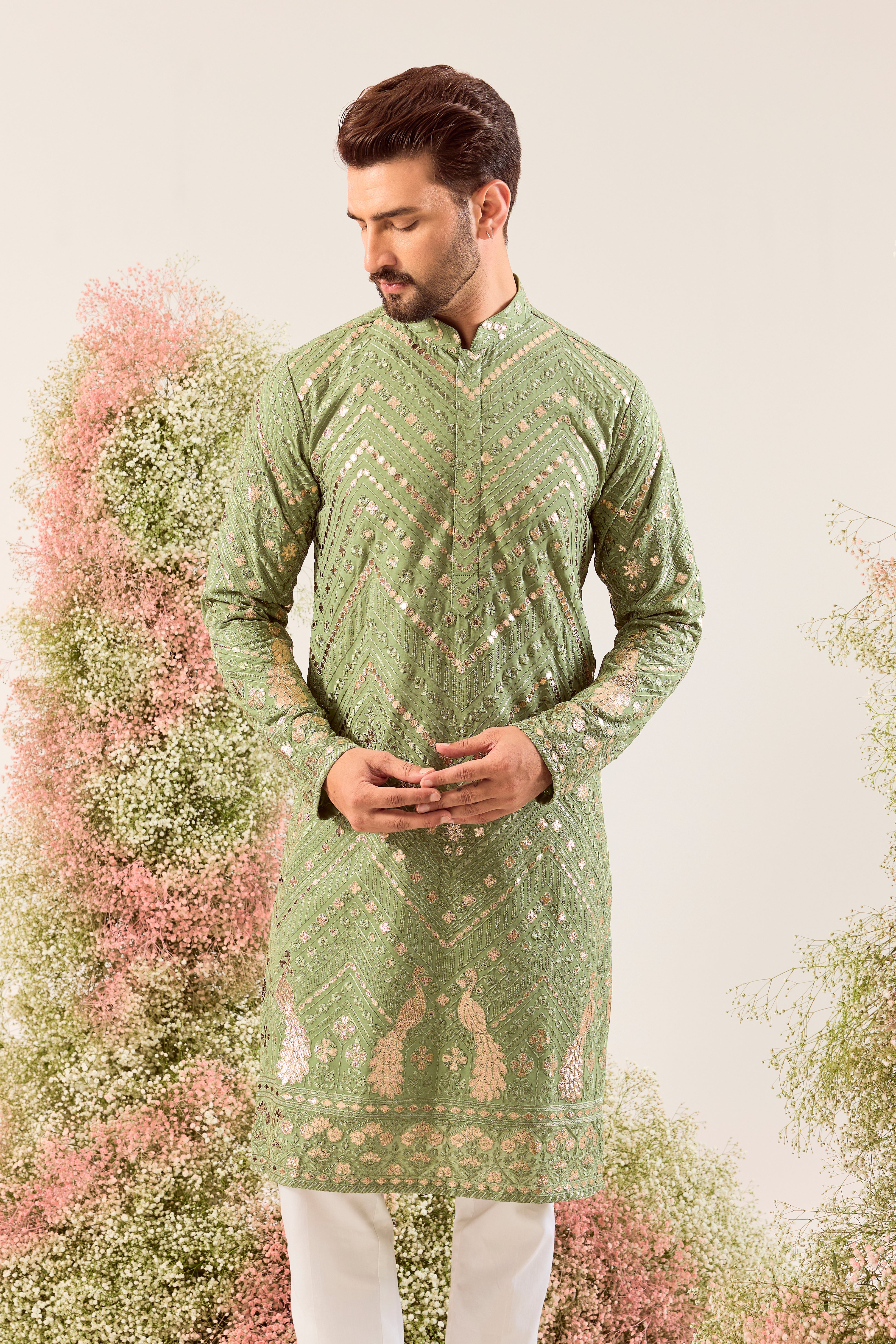 green leather patchwork kurta with intricate peacock motifs