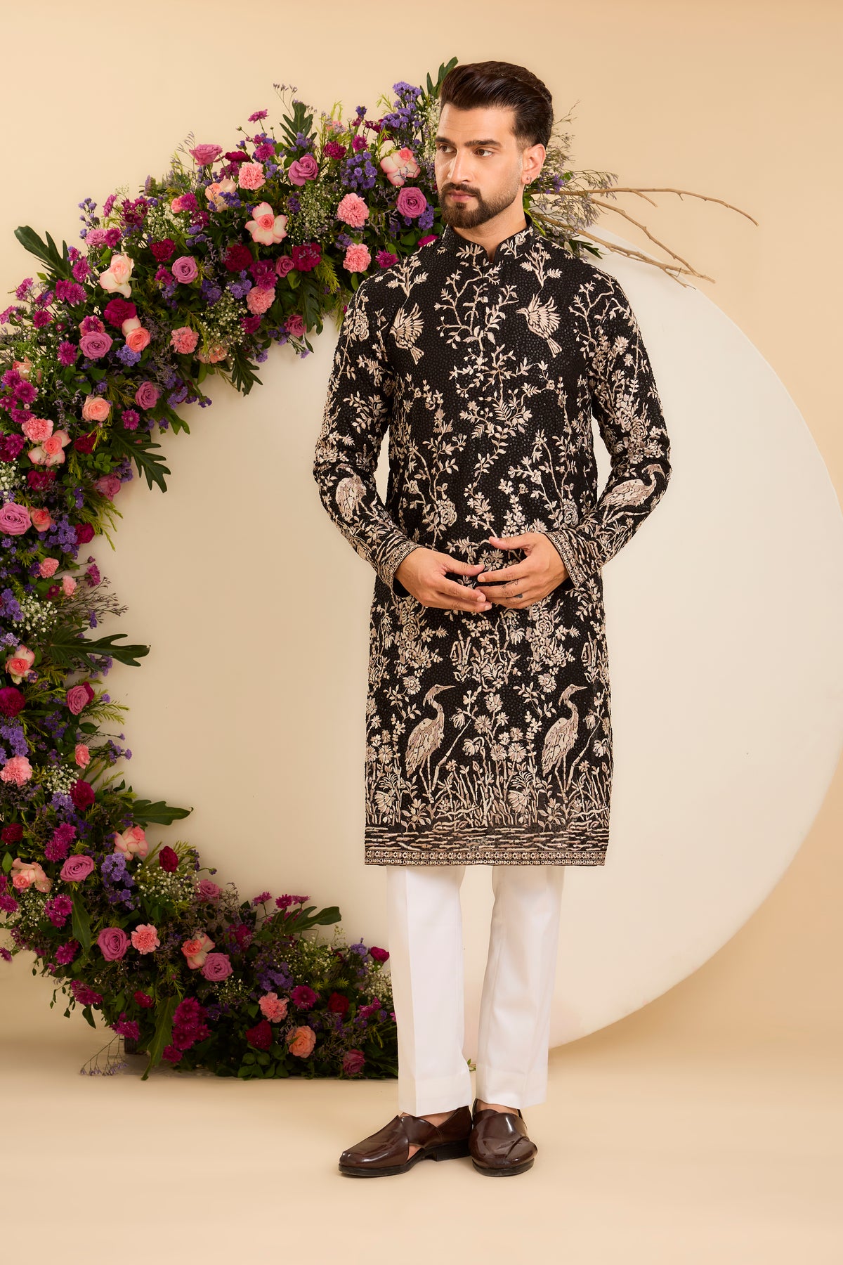 A Midnight Sequin Kurta Embellished in Golden Threadwork and majestic flamingos