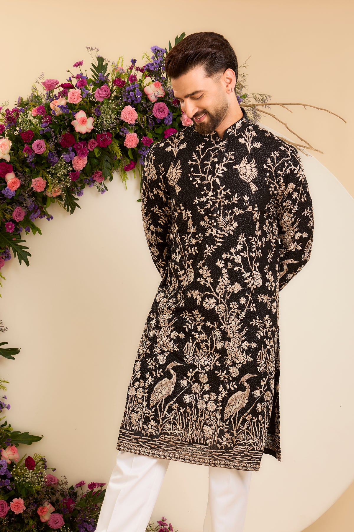 A Midnight Sequin Kurta Embellished in Golden Threadwork and majestic flamingos