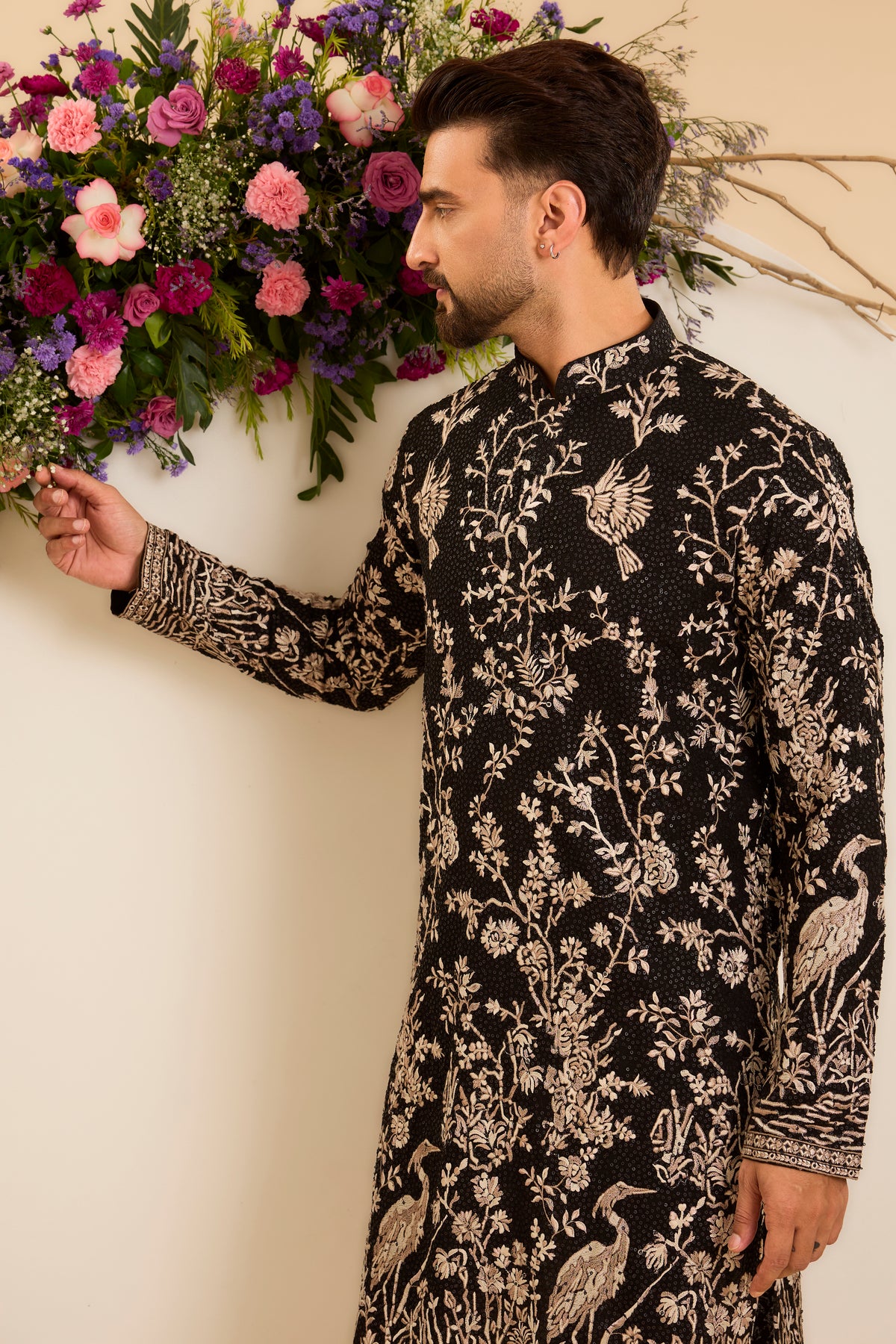 A Midnight Sequin Kurta Embellished in Golden Threadwork and majestic flamingos