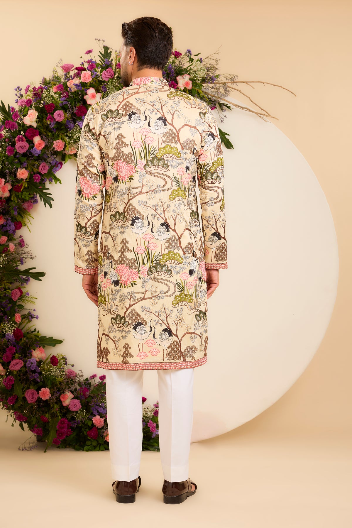 A Tropical cream Silk Kurta Alive with Flora and Fauna
