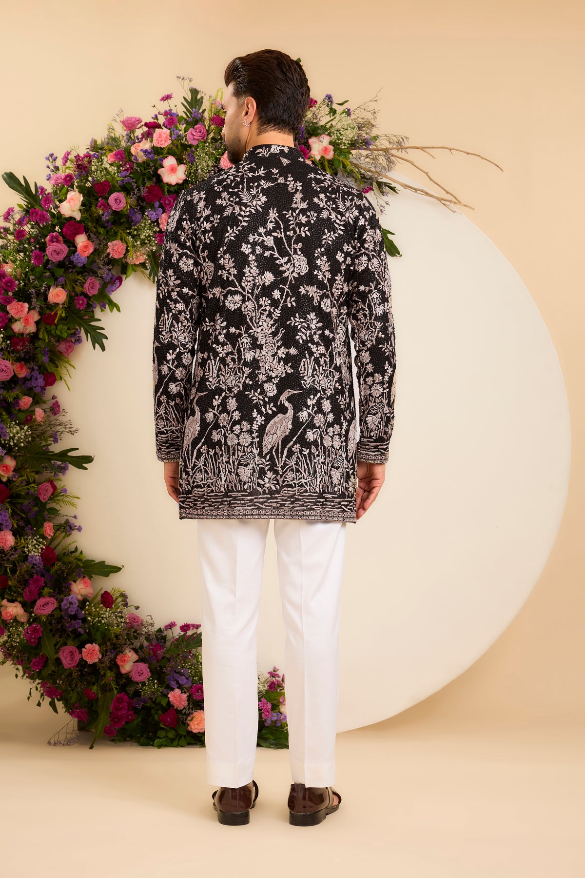A Midnight Sequin short Kurta Embellished in Golden Threadwork and majestic flamingos
