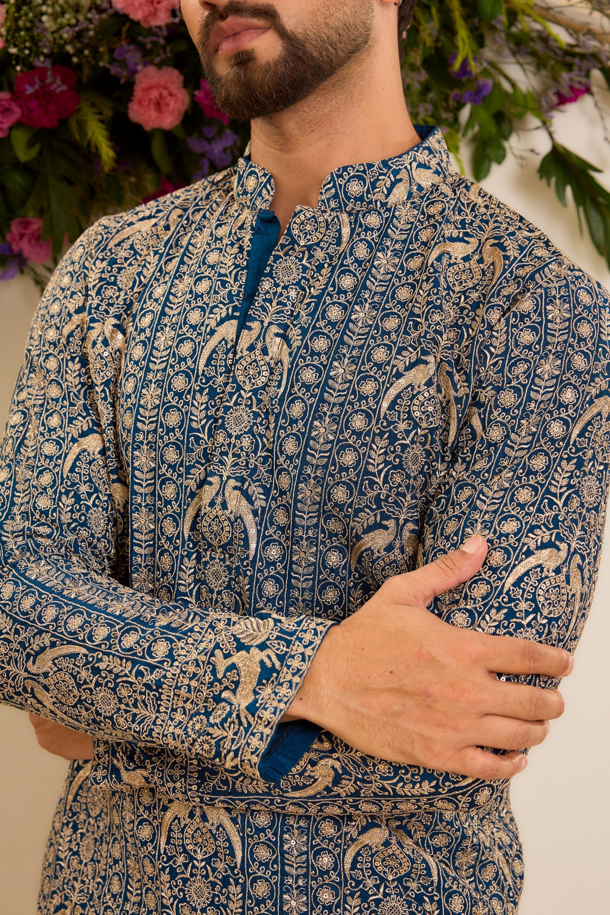 A Regal Blue short Kurta Woven with Ornate Zari Details