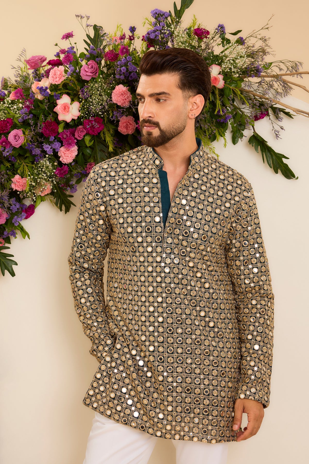 Teal short mirror work kurta drapped in zari