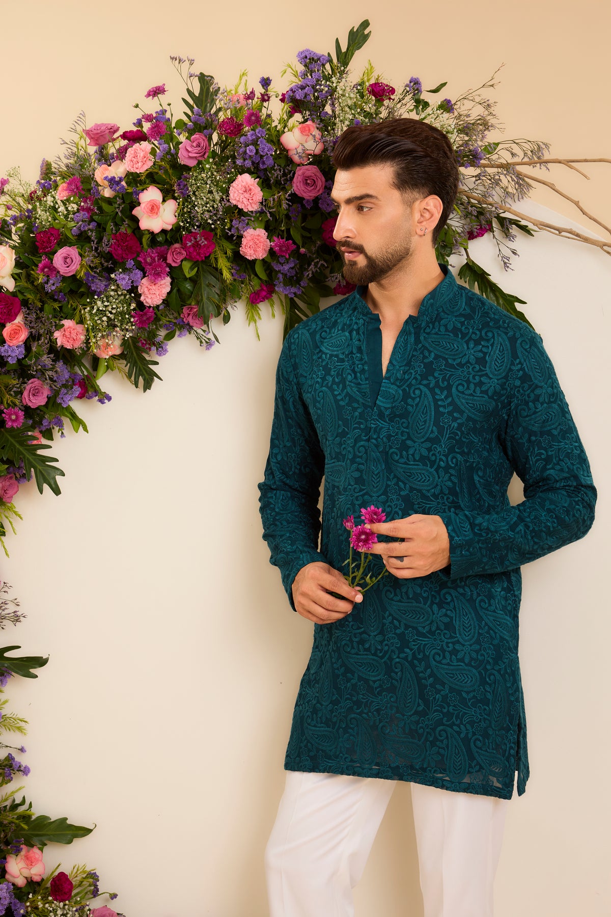 A Teal Short chikankari Kurta with Intricate Paisley Embroidery