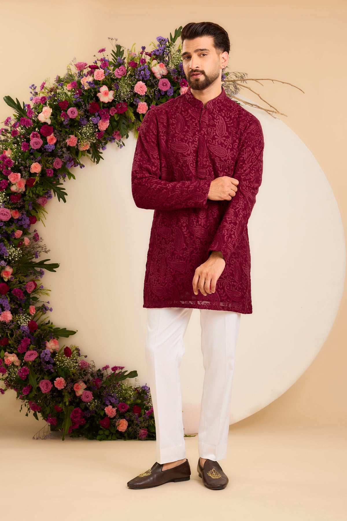 A  red/maroon chikankari Short Kurta with Intricate Paisley Embroidery