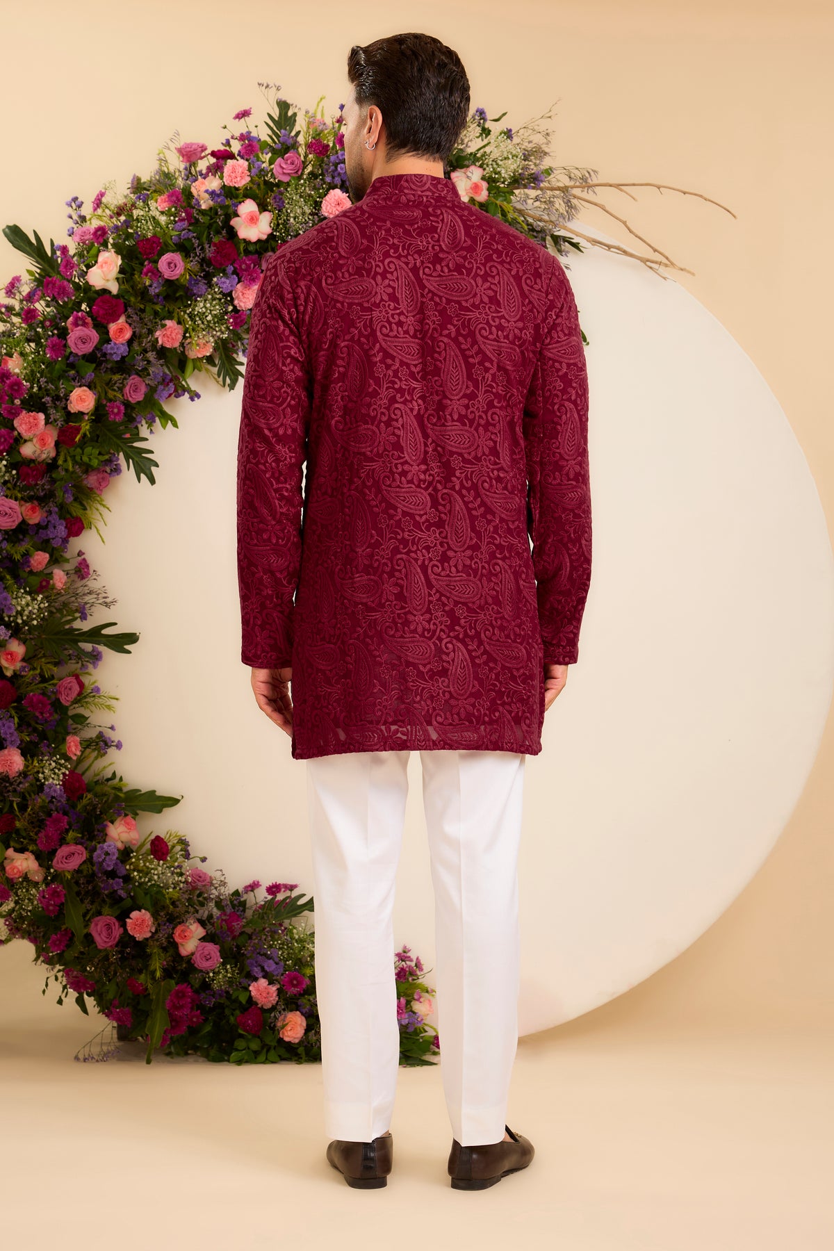 A  red/maroon chikankari Short Kurta with Intricate Paisley Embroidery