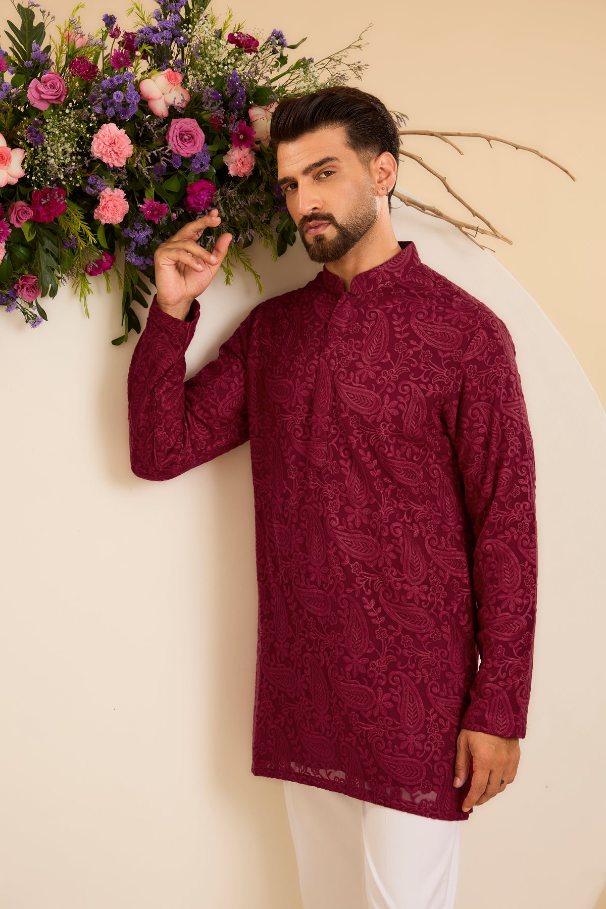 A  red/maroon chikankari Short Kurta with Intricate Paisley Embroidery