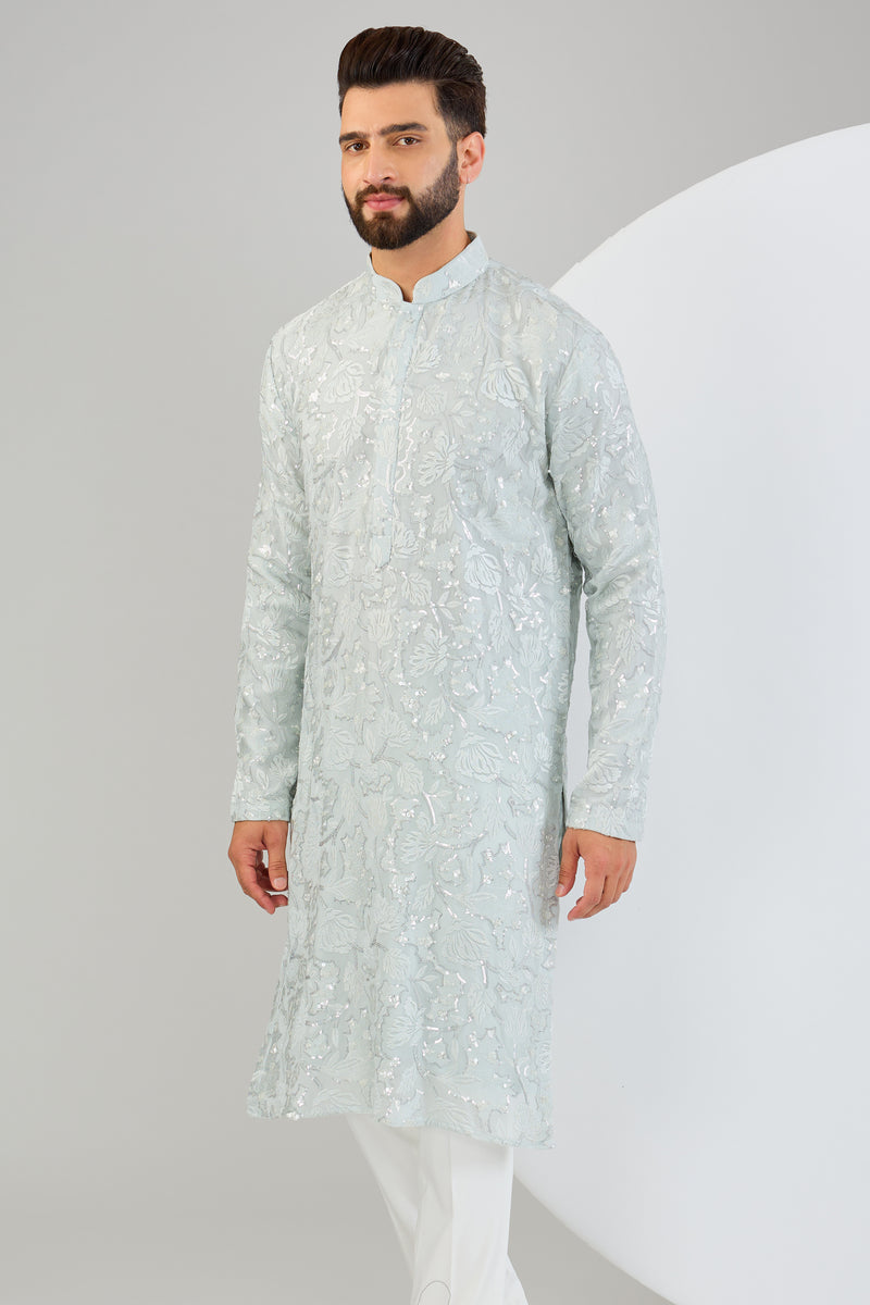 Powder blue chikankari kurta with detailed floral embroidery and tone-to-tone sequin work. - kasbahmen