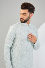 Powder blue chikankari kurta with detailed floral embroidery and tone-to-tone sequin work. - kasbahmen